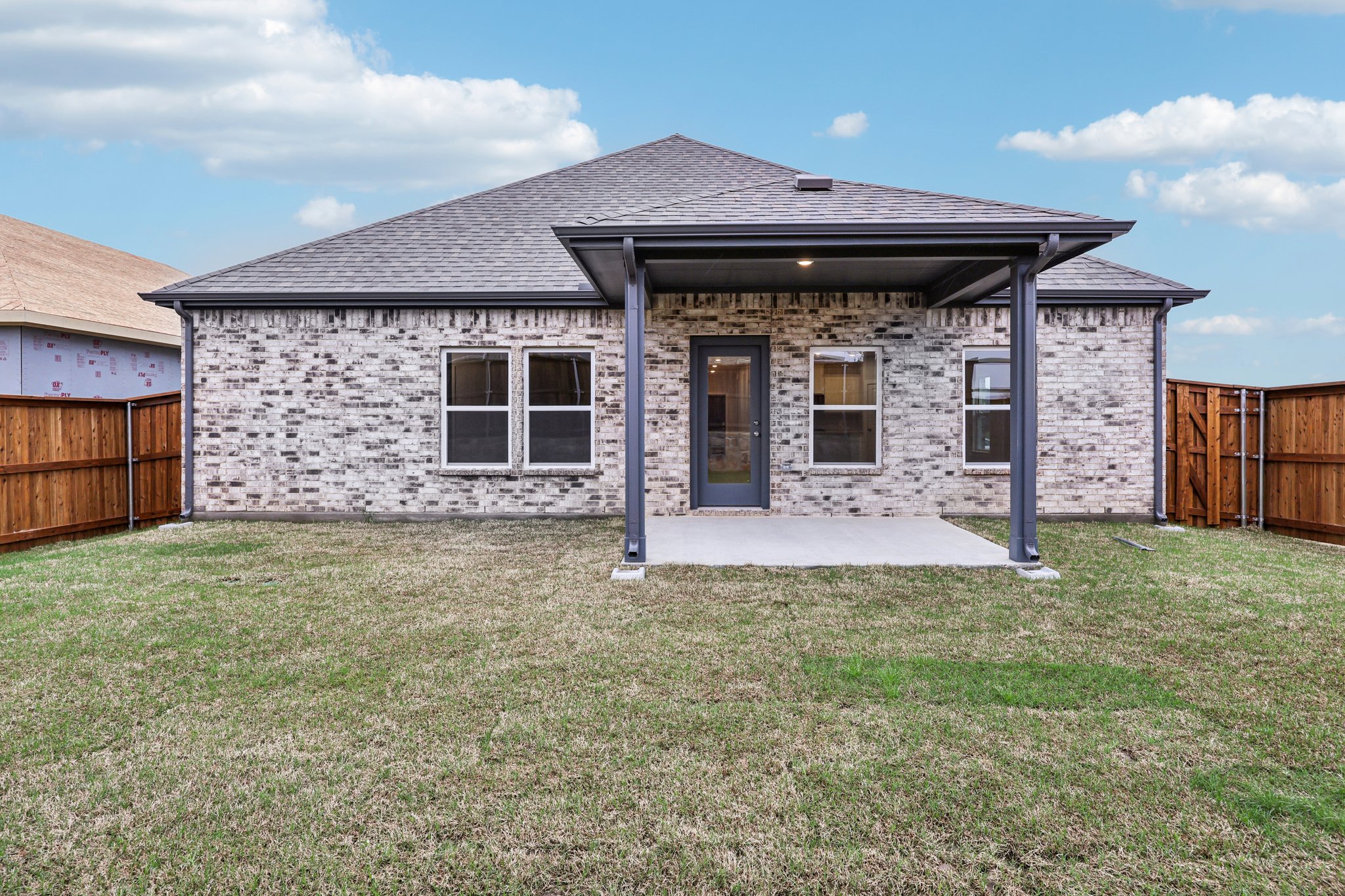 A house with a fence around it.