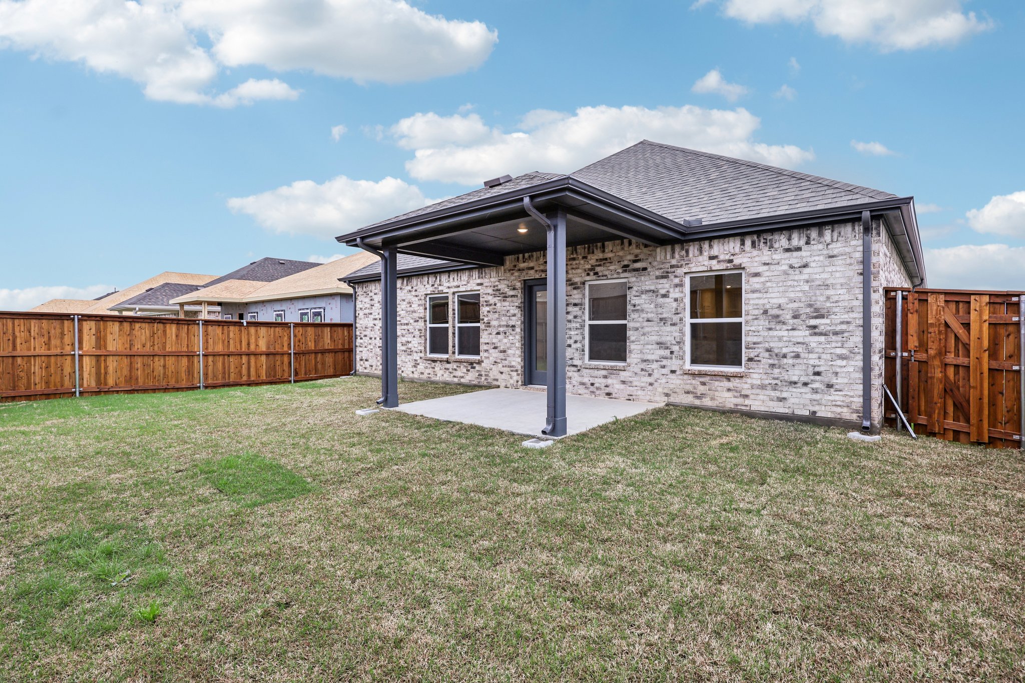 A house with a fence around it.