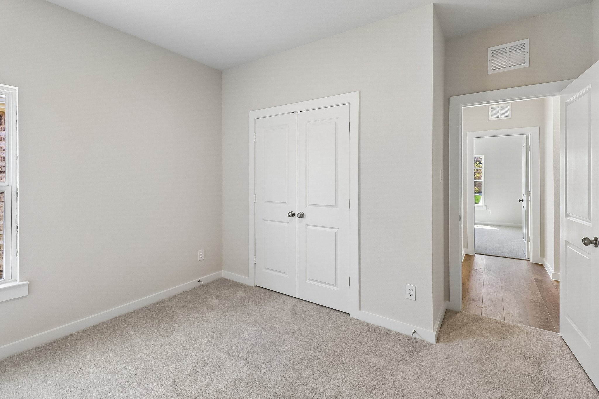 A room with white doors.