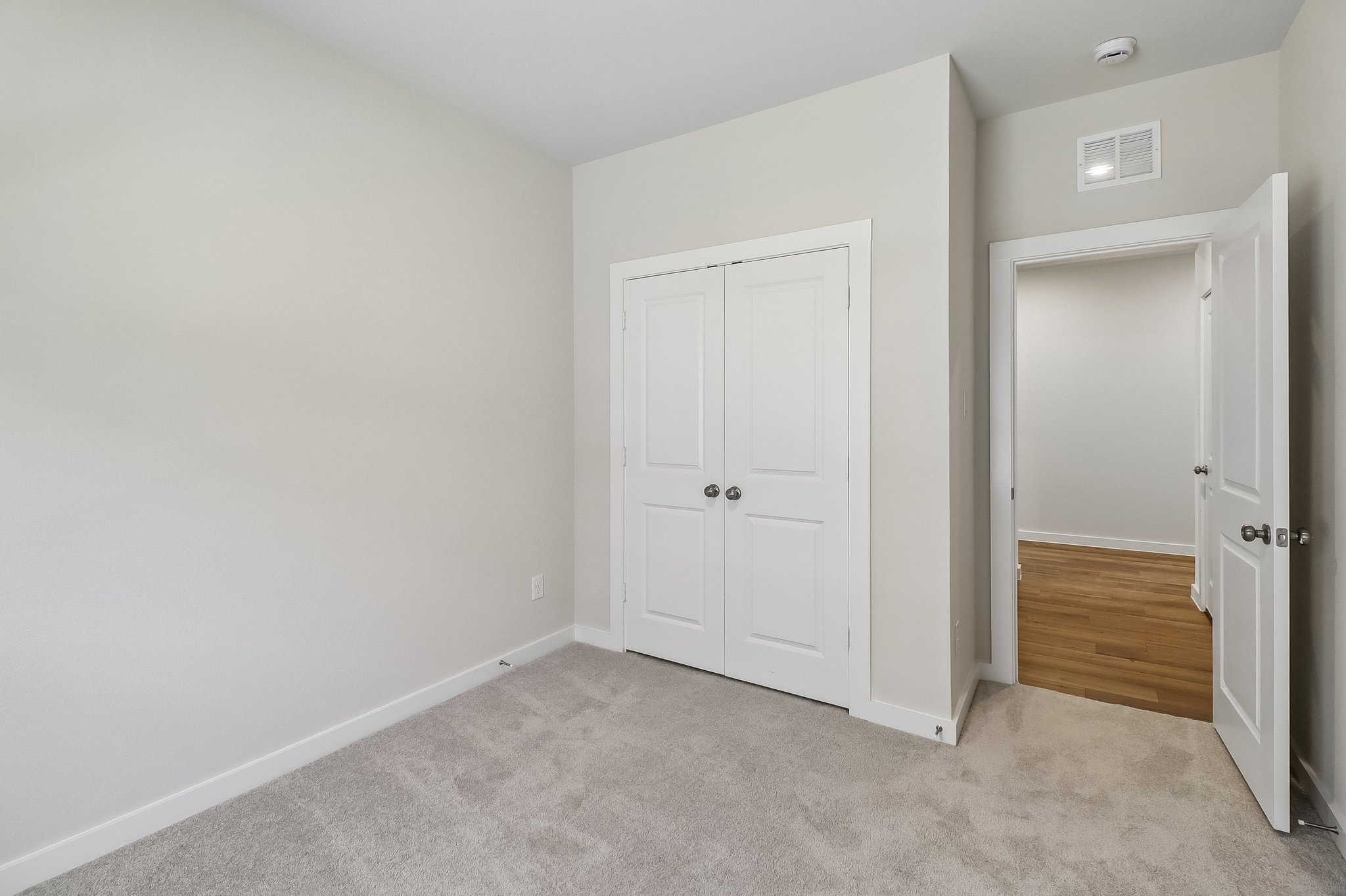 A room with white doors.