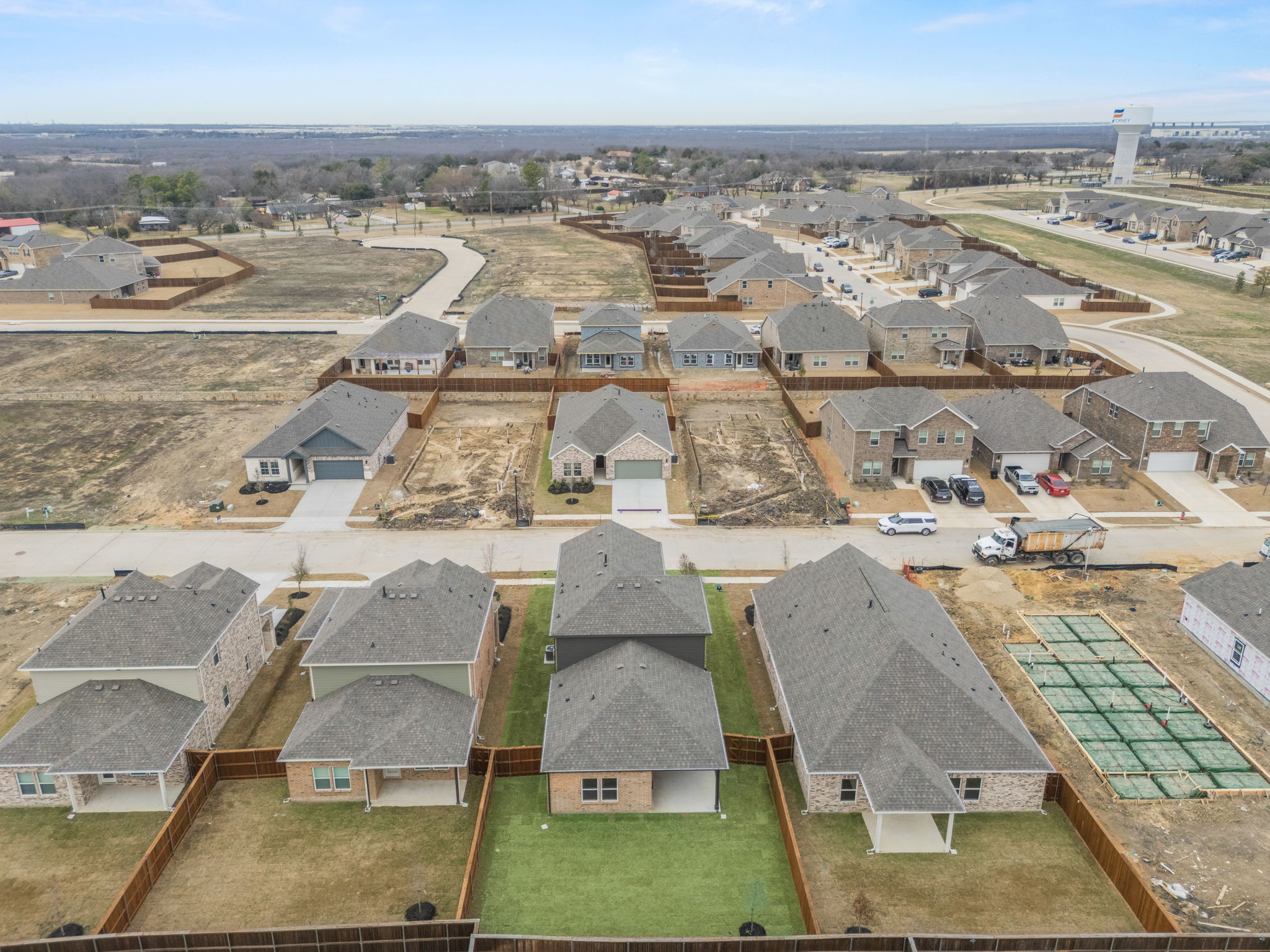 A group of buildings with roofs.