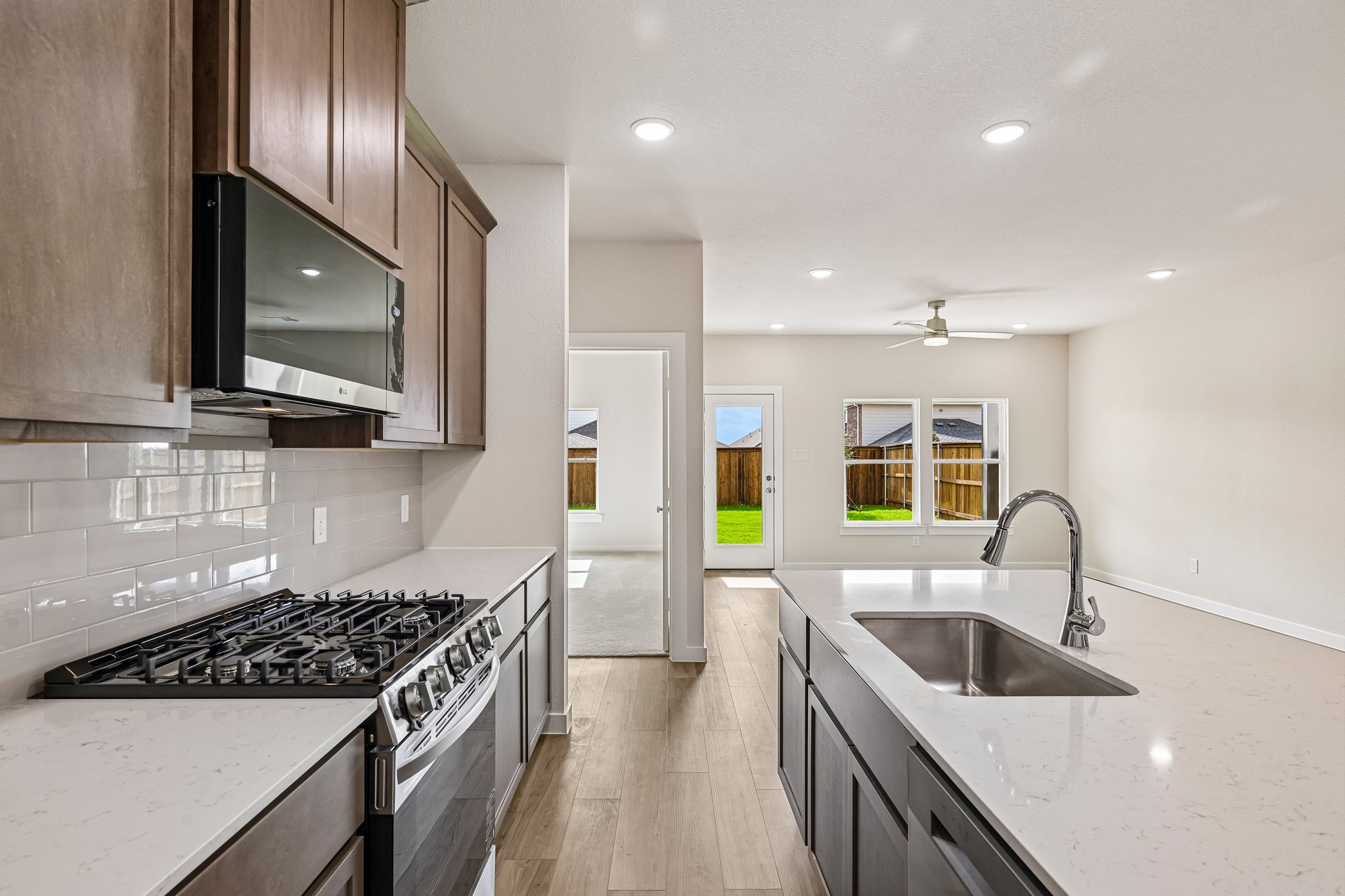 A kitchen with a stove and oven.