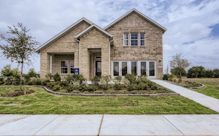 Brodie model front entry at Overland Grove by Century Communities