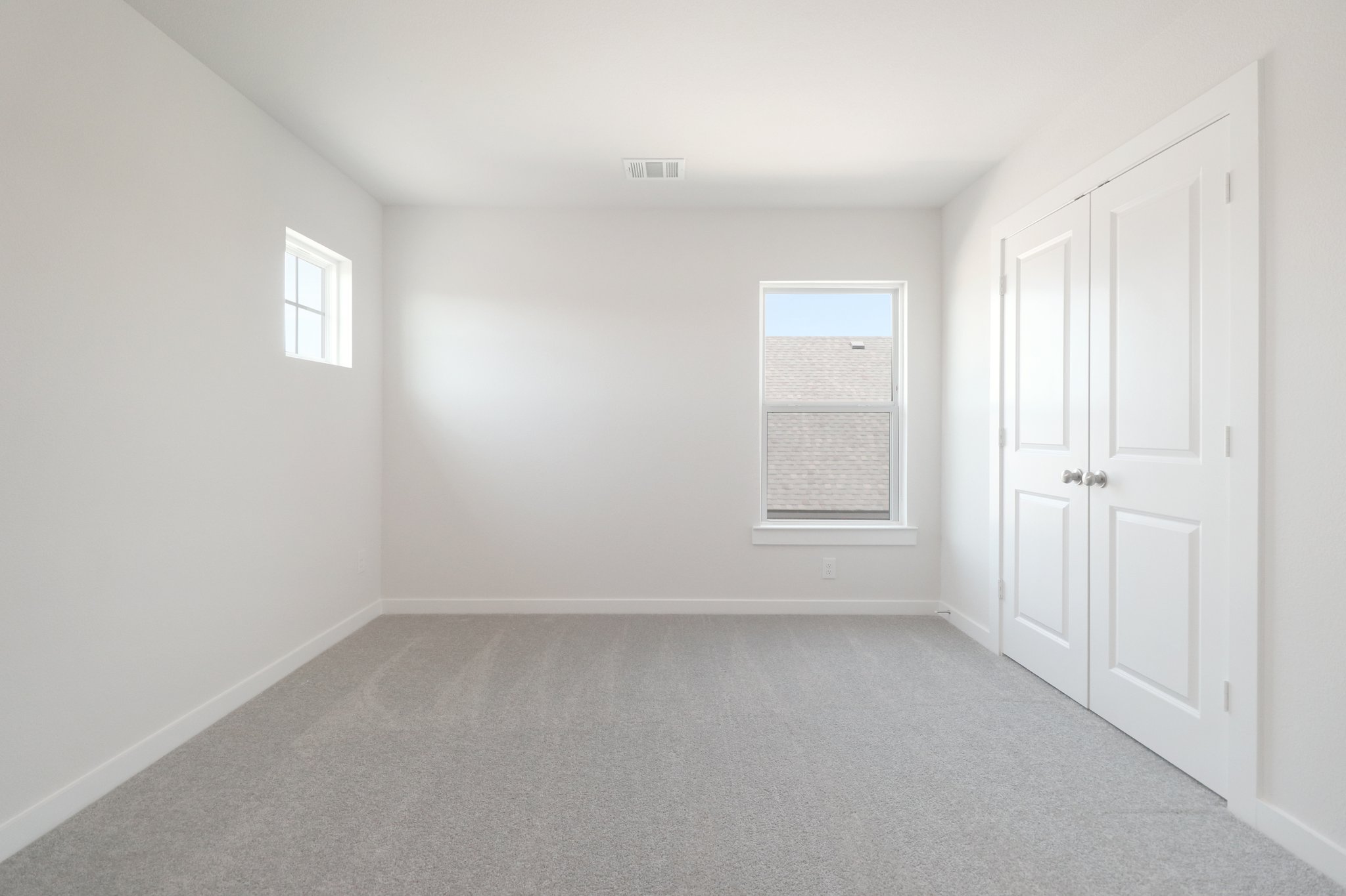 A room with white doors.