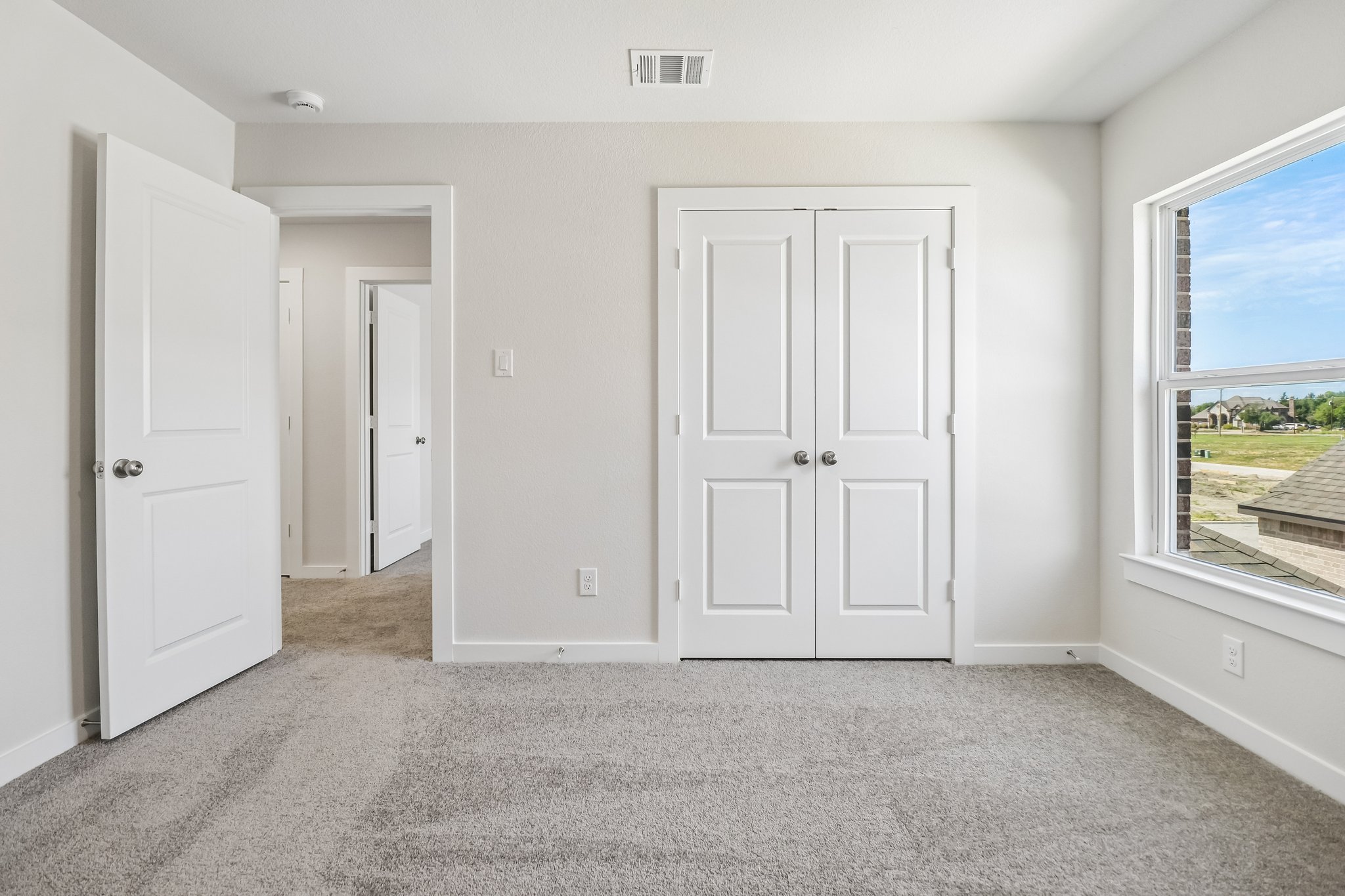 A room with white doors.