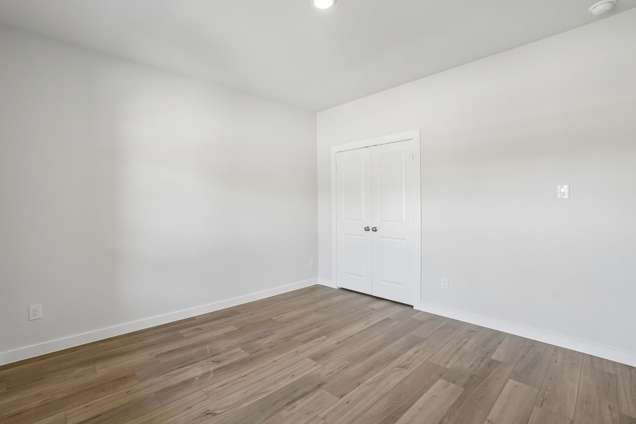 A room with white doors.