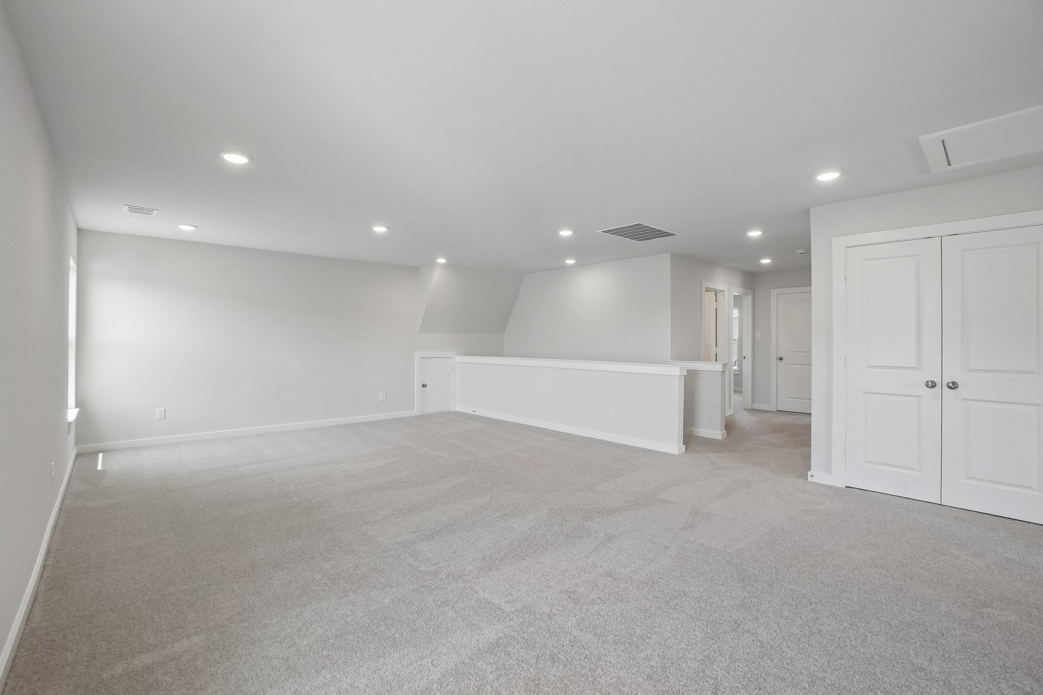 A room with white doors.
