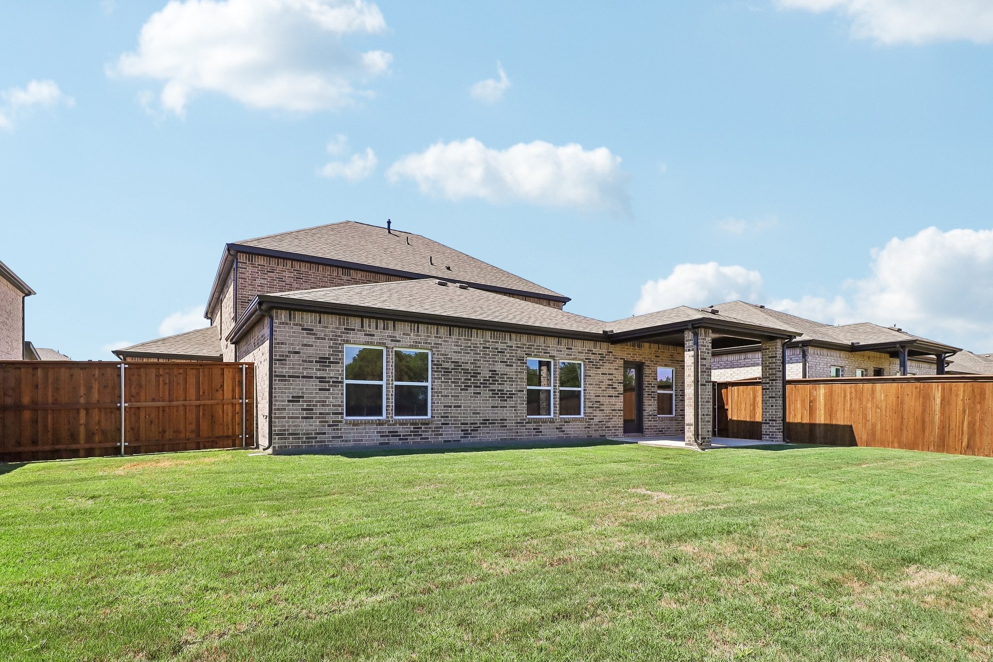 A house with a fence around it.