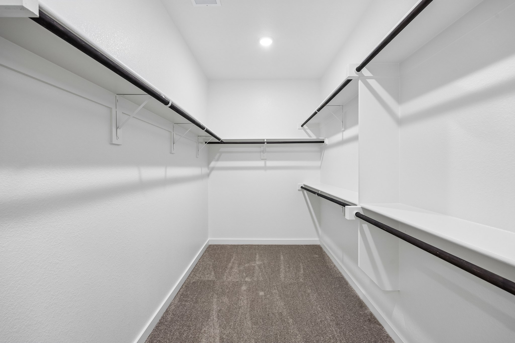 A white hallway with white walls.