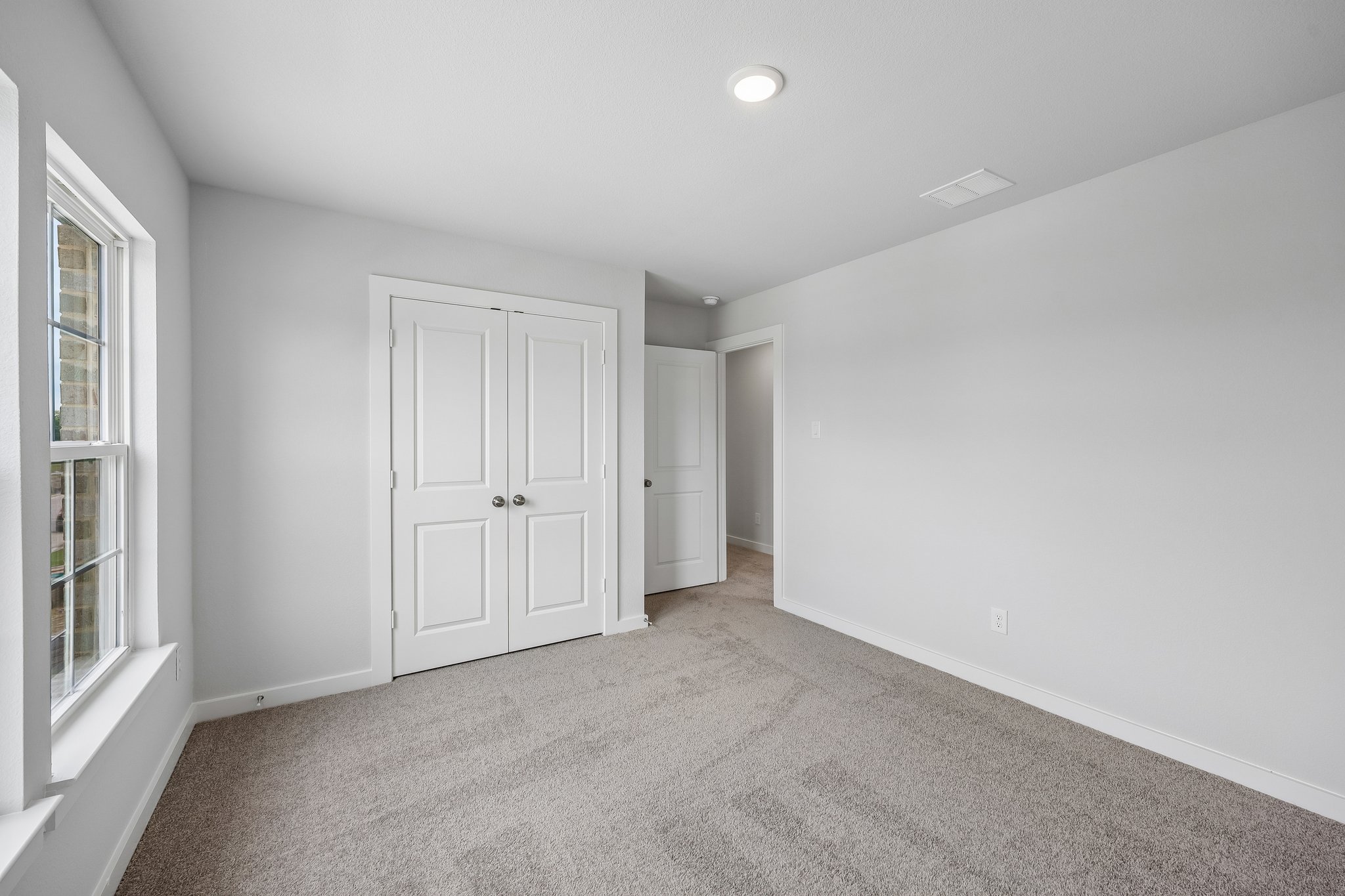 A room with white doors.
