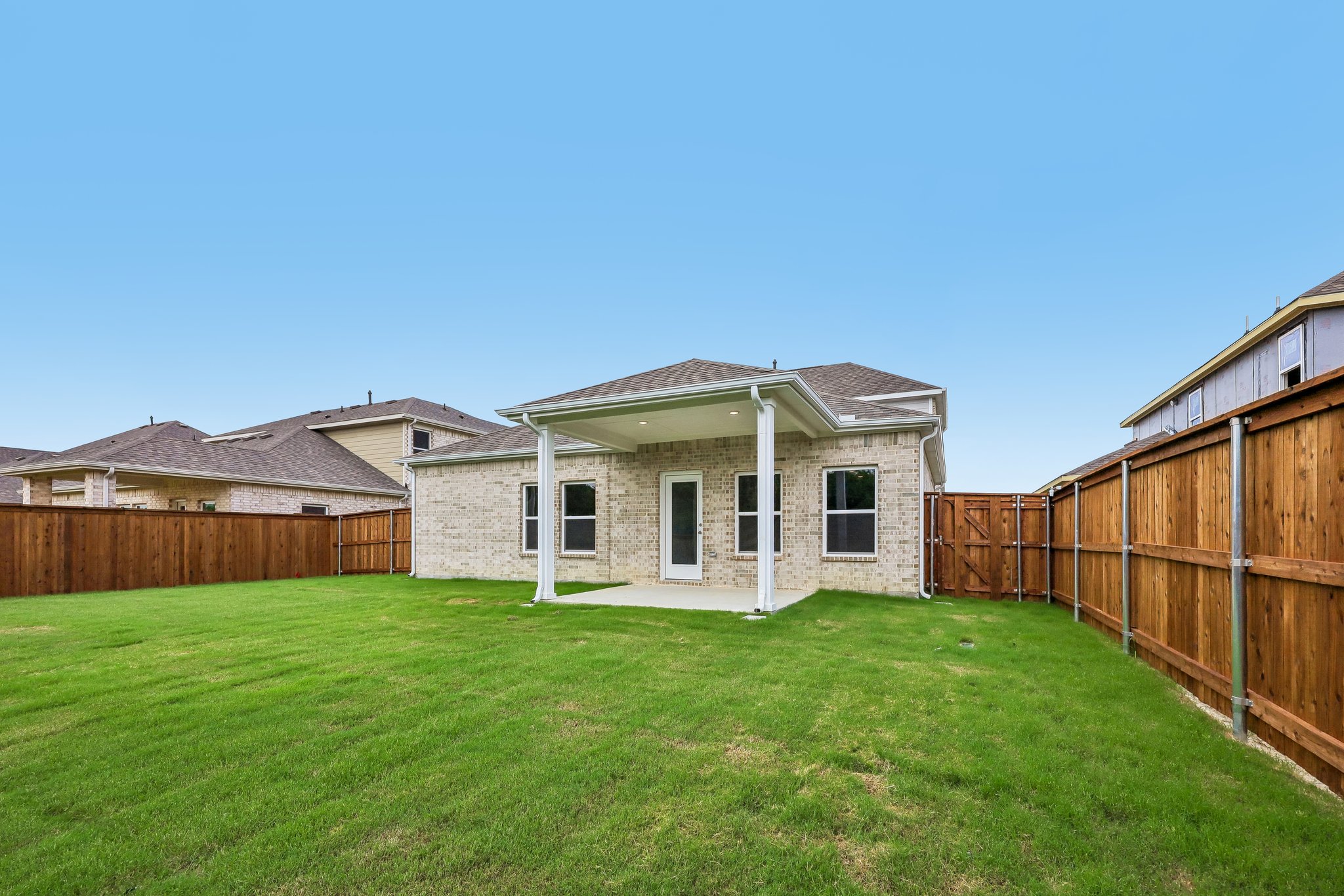 A house with a fence around it.