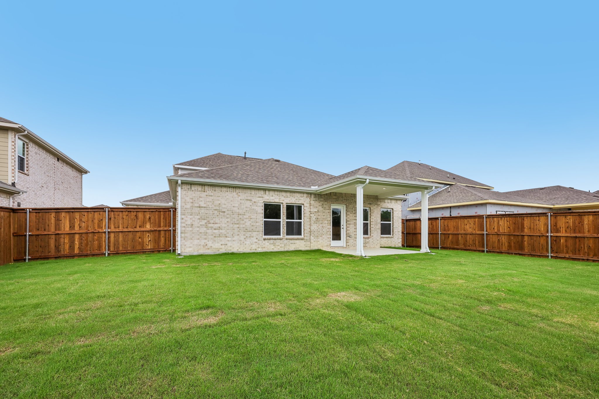 A house with a fence around it.