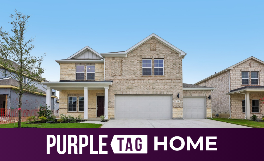 A large house with a driveway.