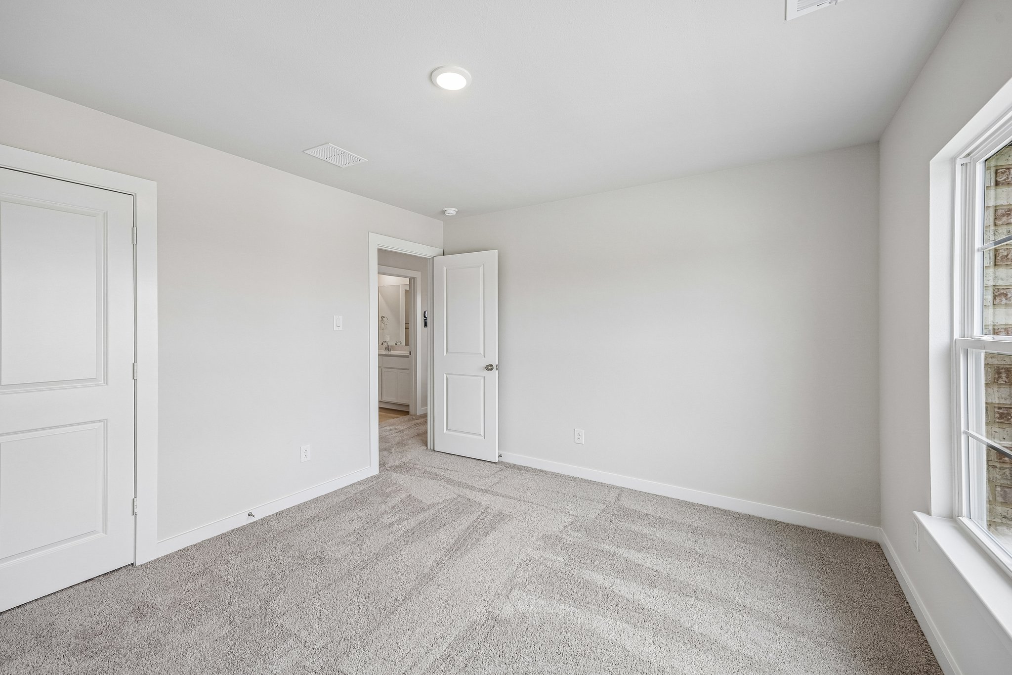 A room with white doors.