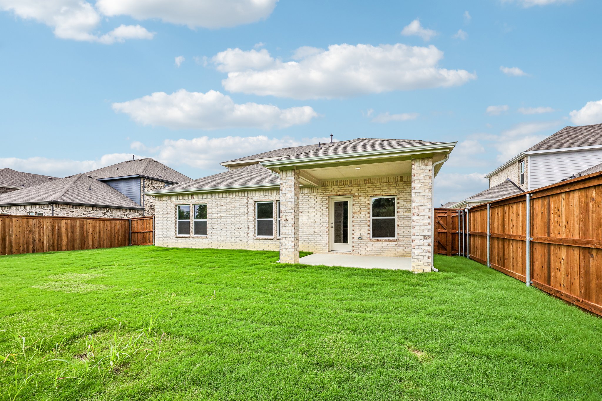 A house with a fence around it.