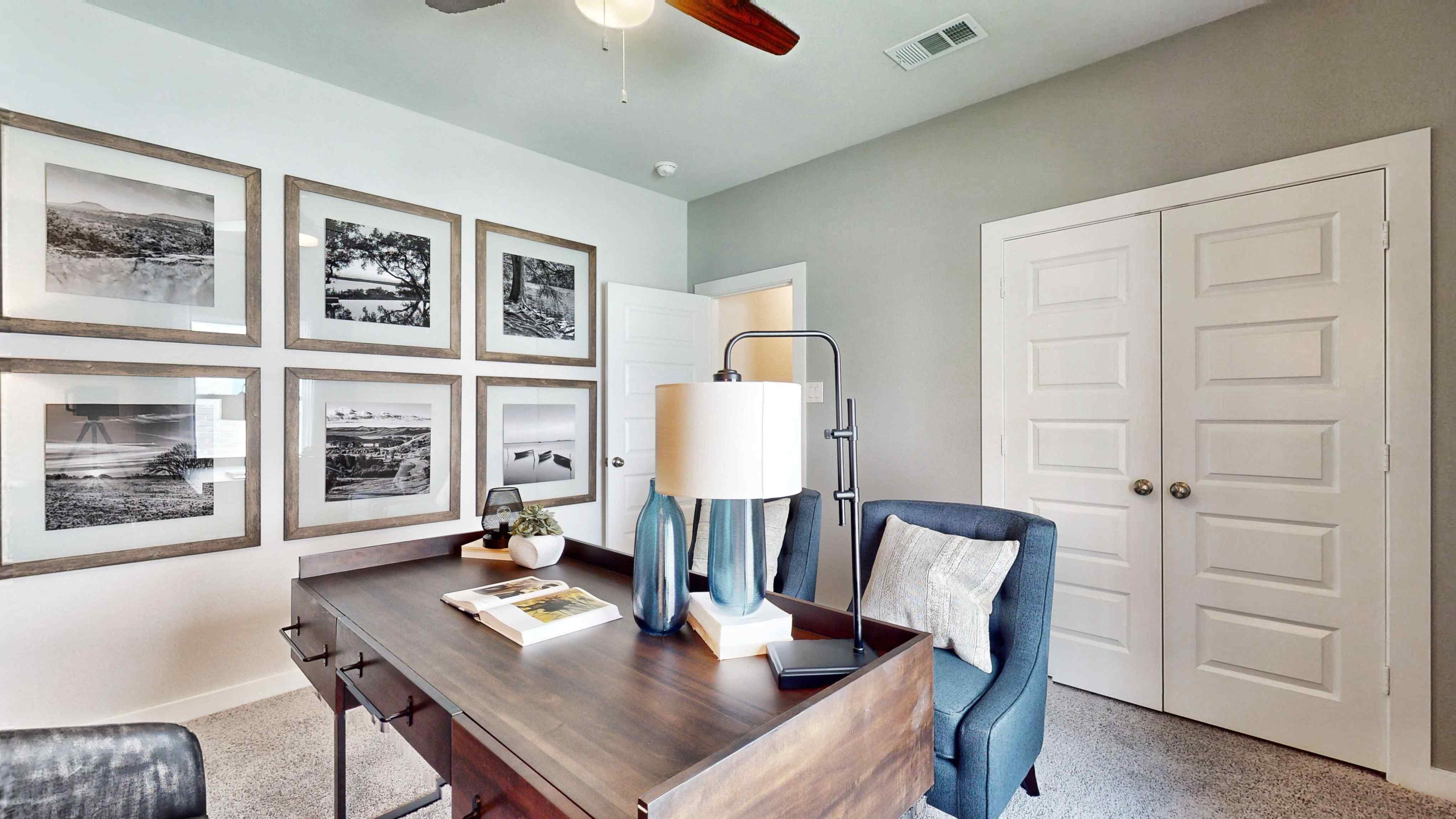 A room with a table and chairs.