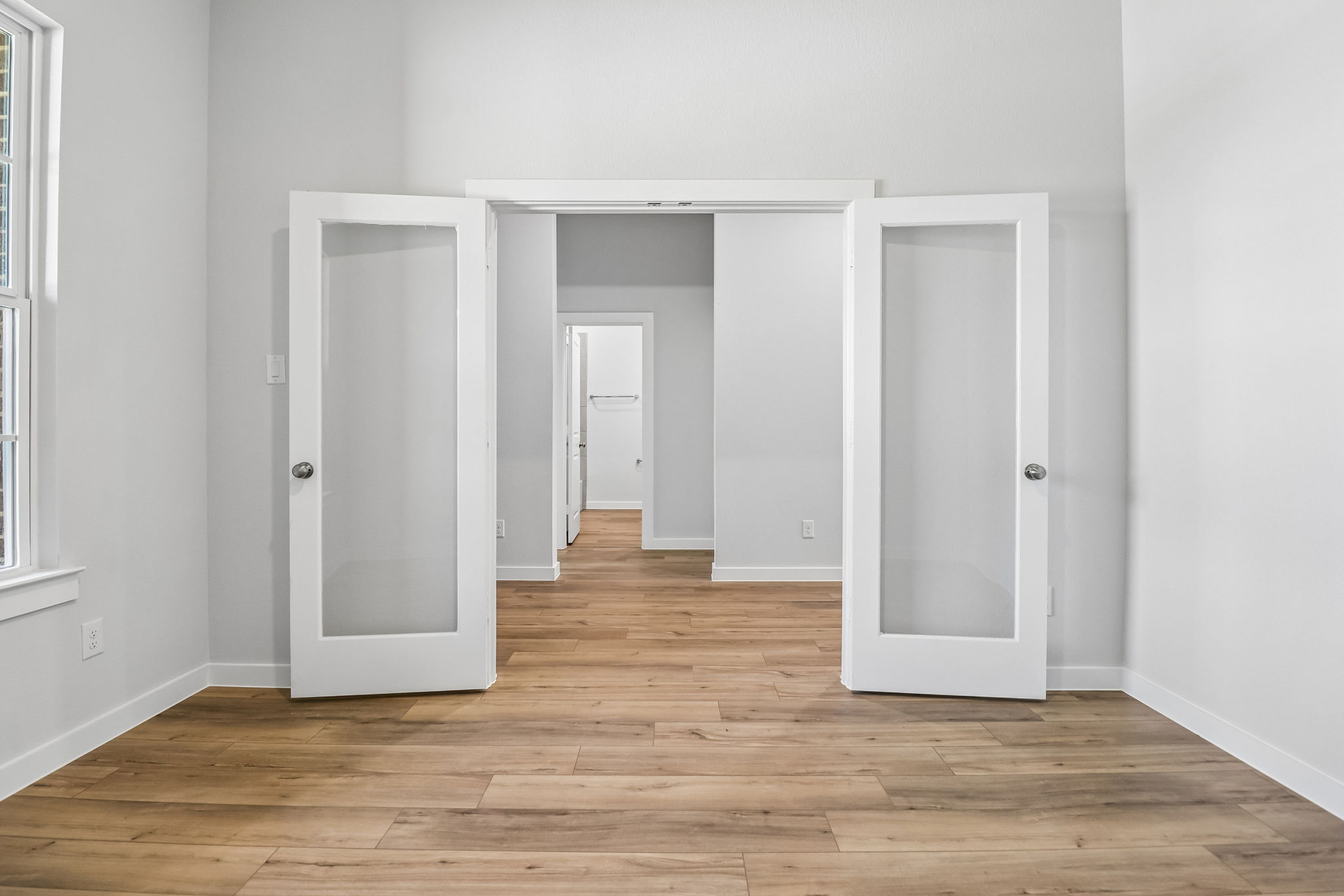 A room with white doors.