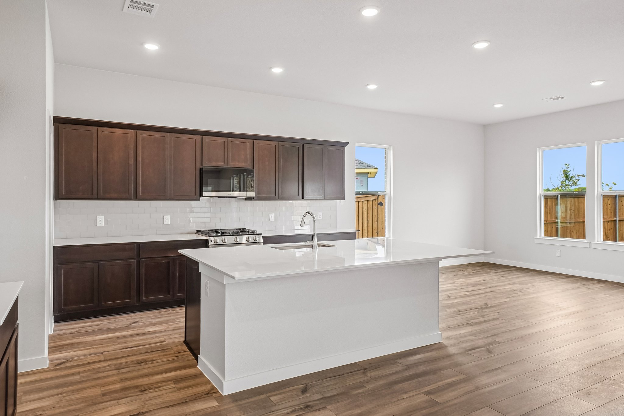 A kitchen with a large island.