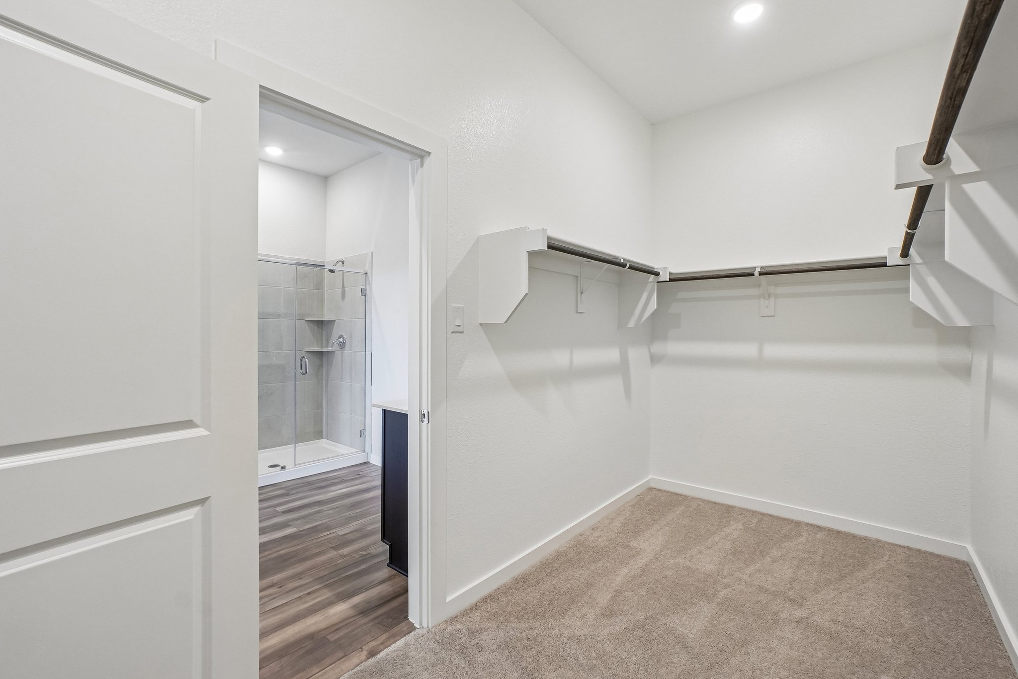 A bathroom with a glass shower.