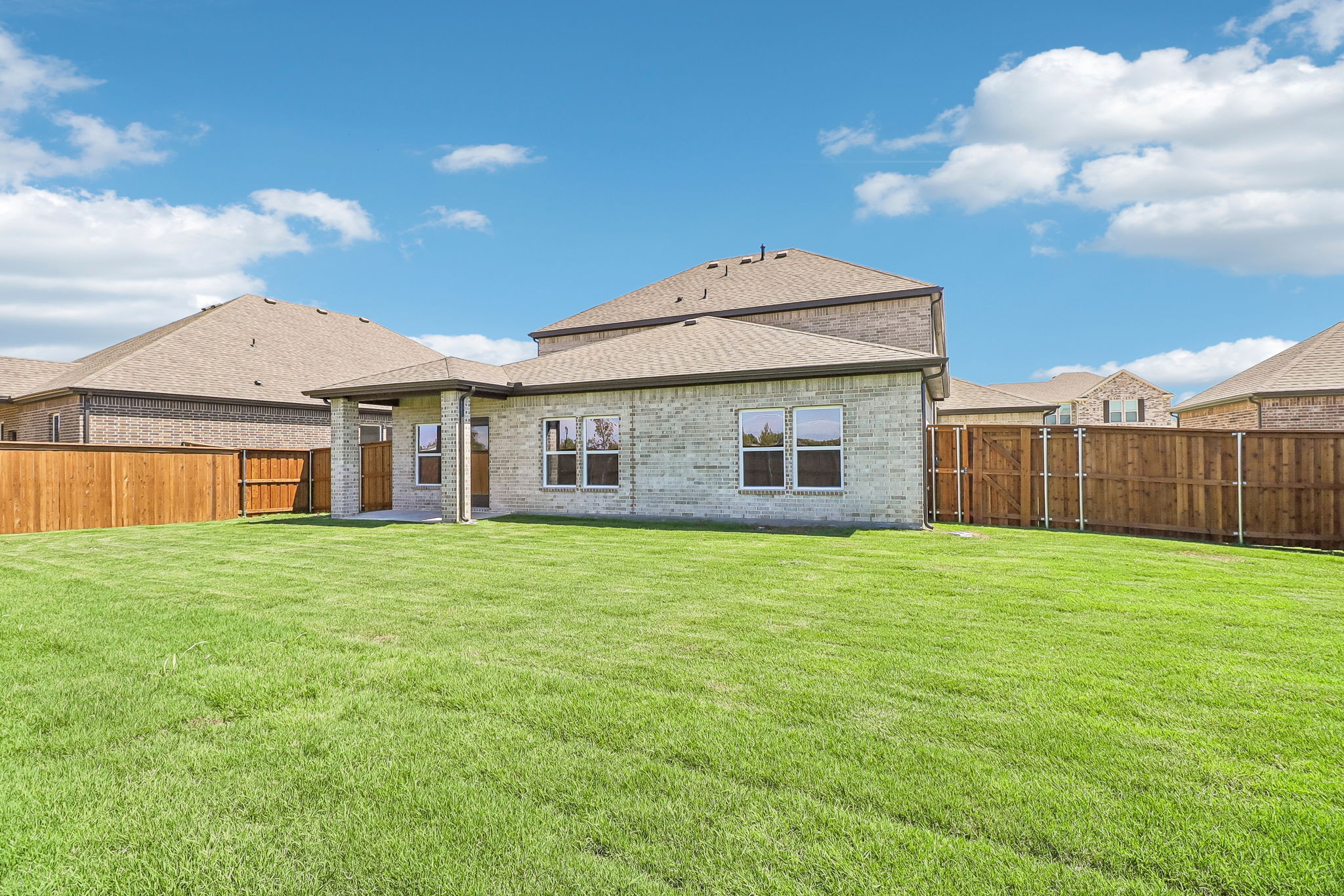 A house with a fence around it.