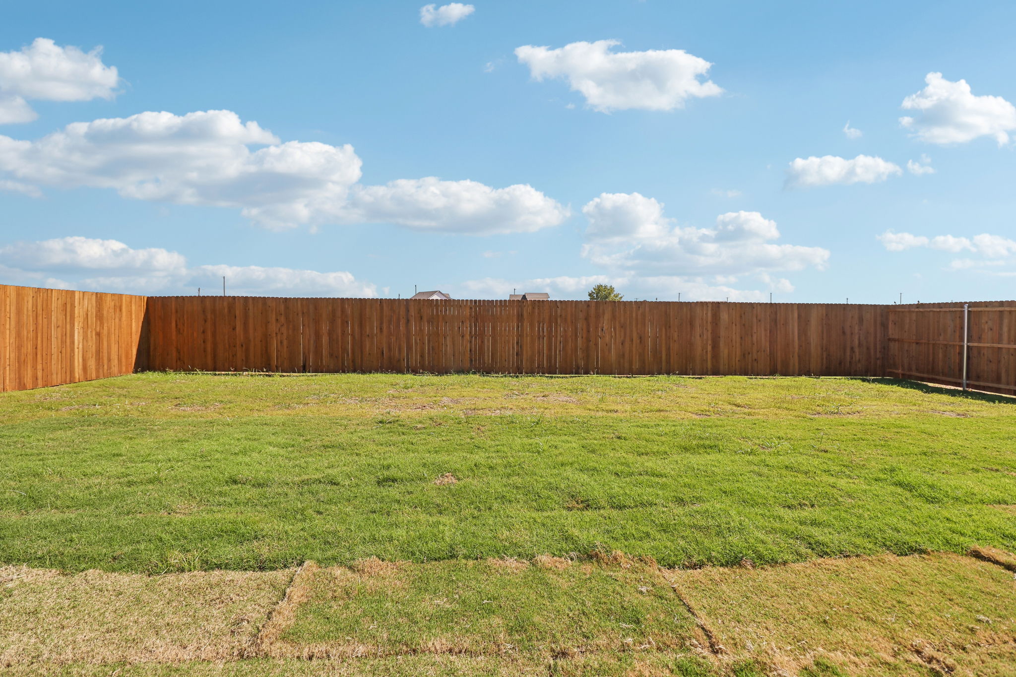 A fenced in field.