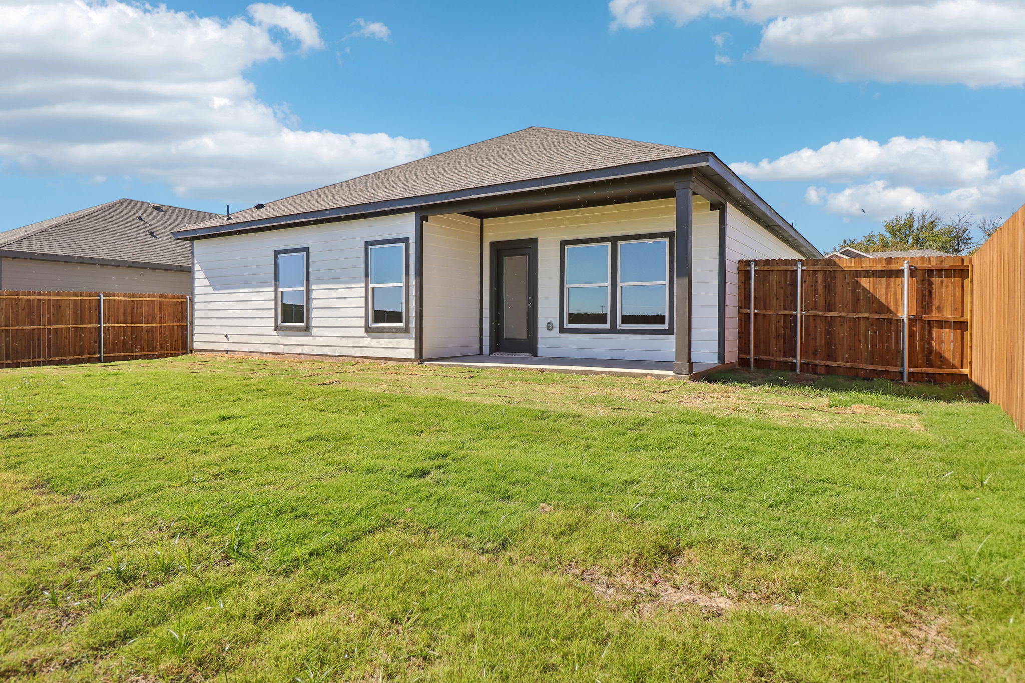 A house with a fence around it.