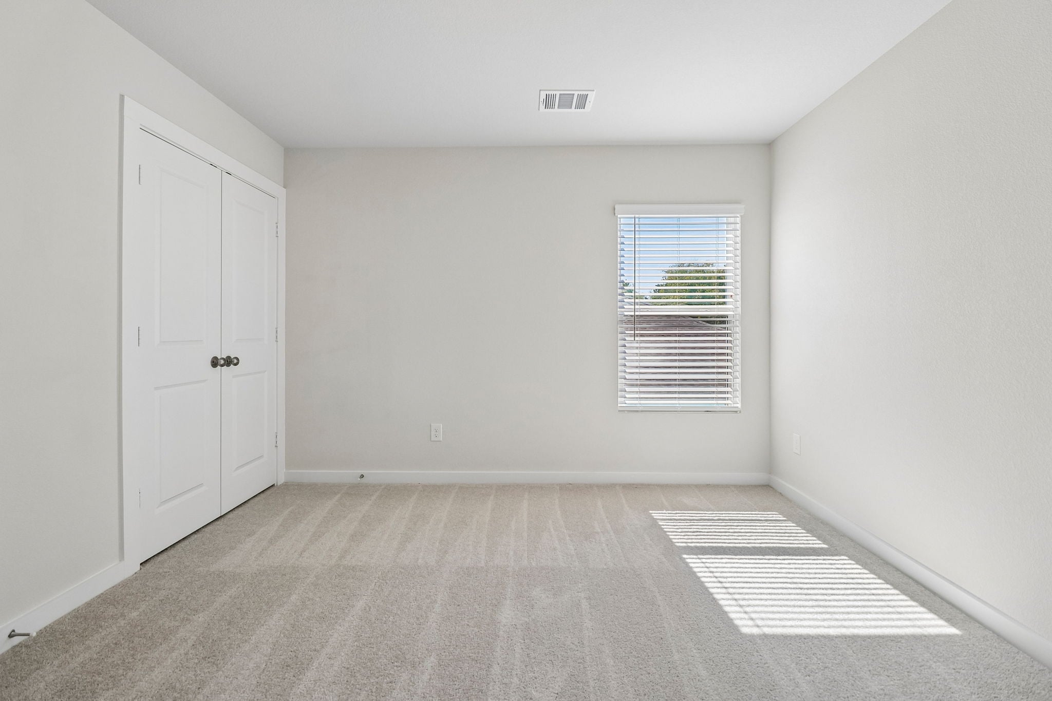 A room with white doors.