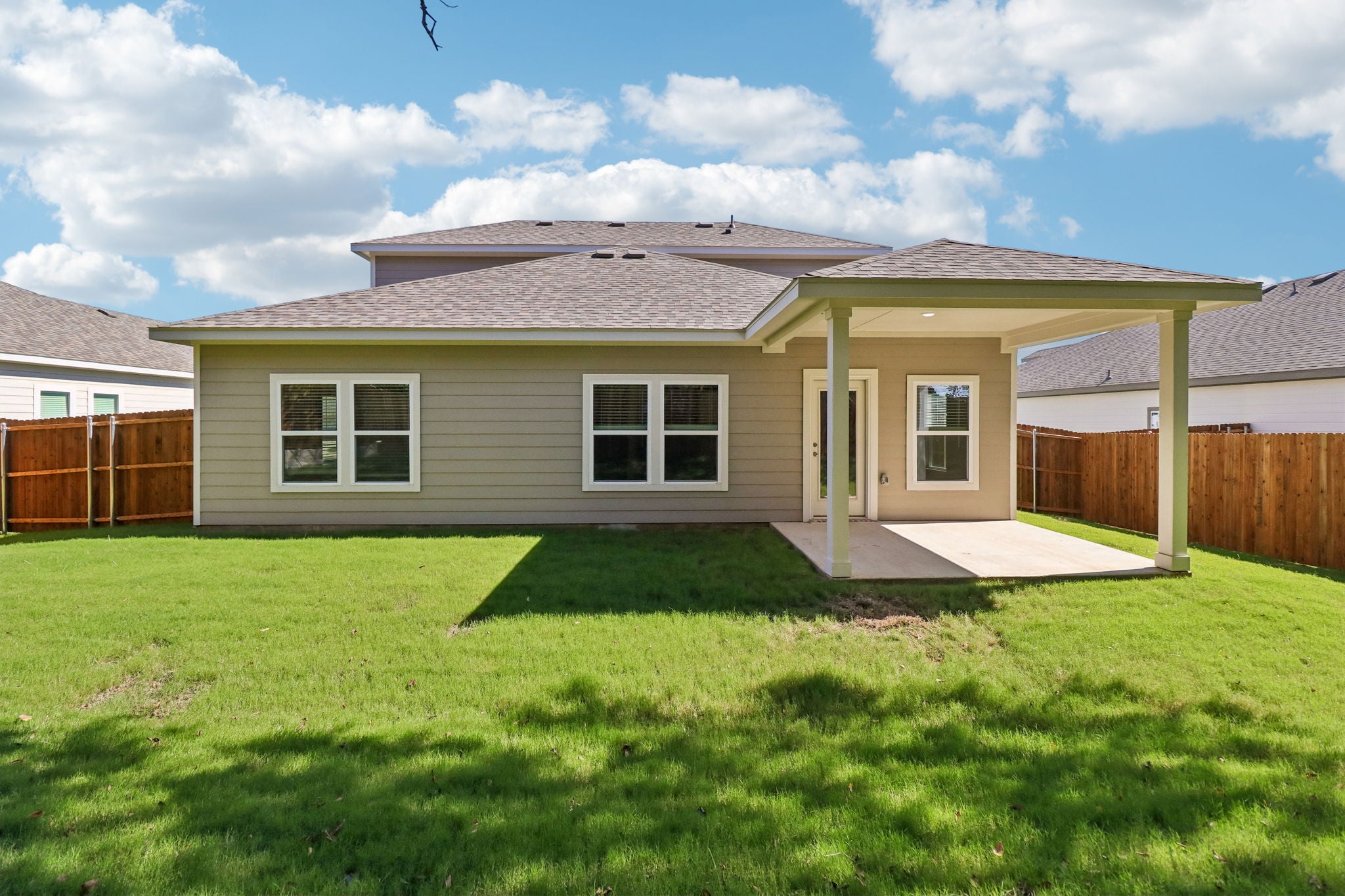 A house with a lawn.