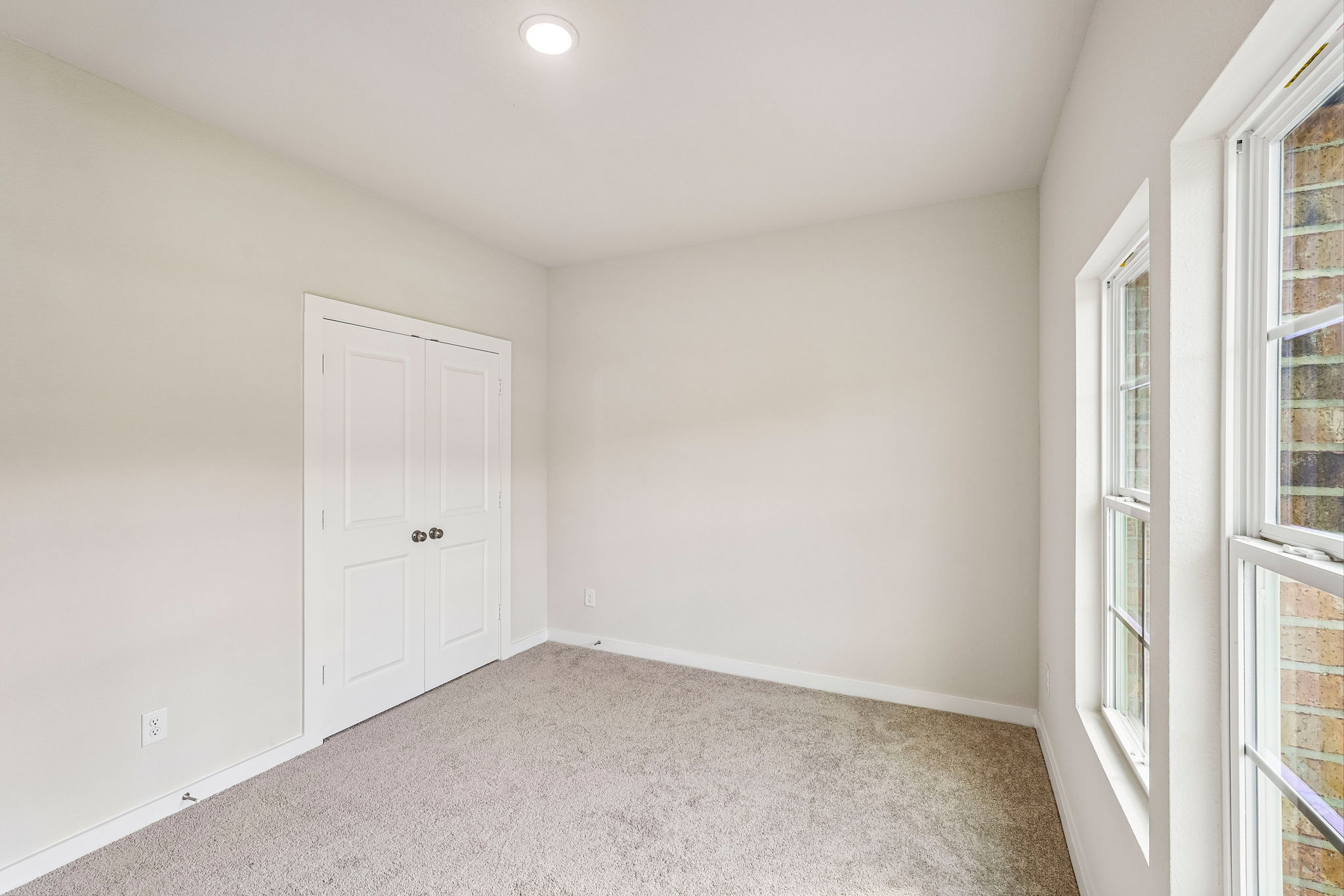 A room with white doors.