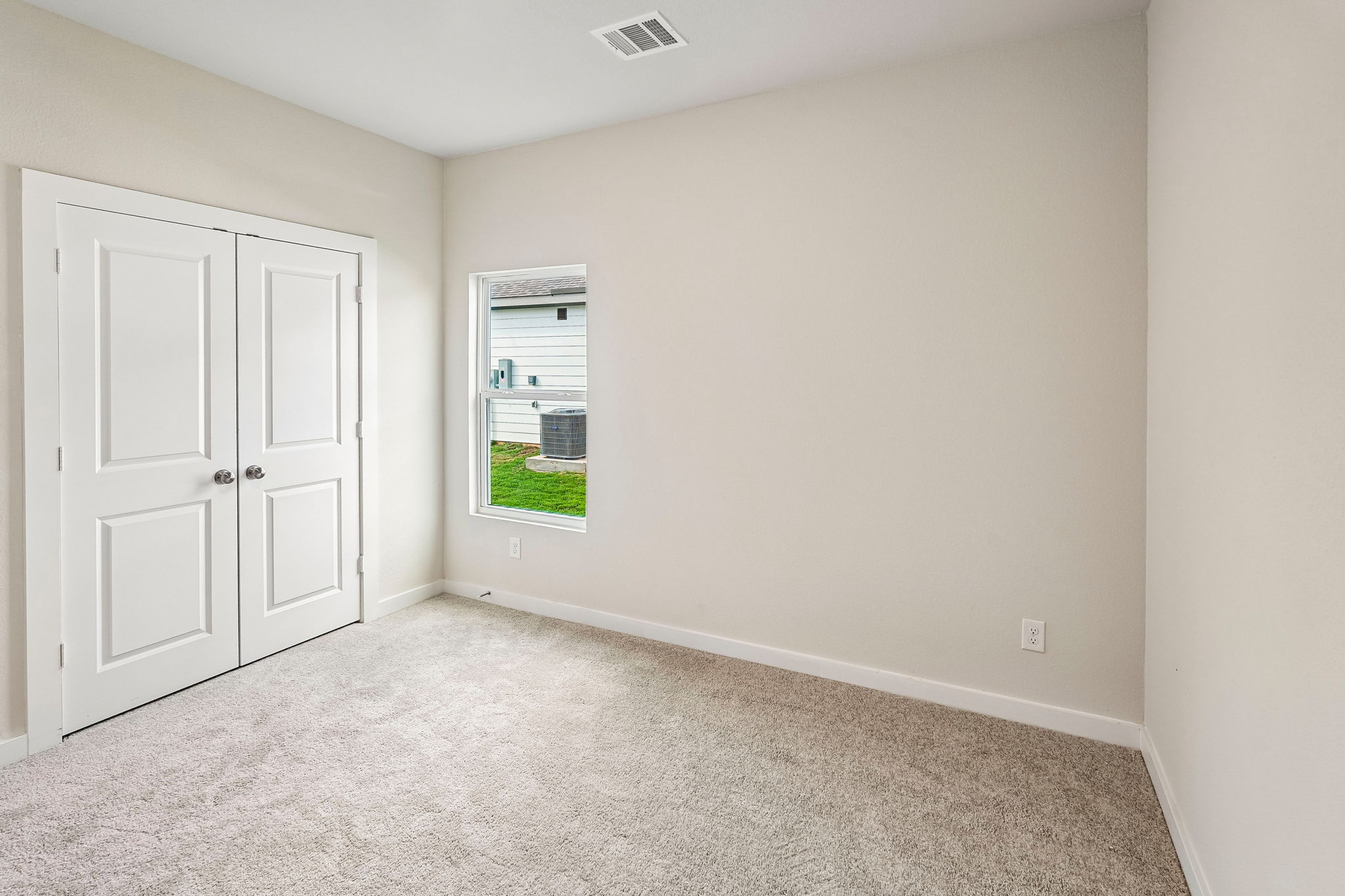 A room with white doors.