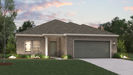 A house with a garage and a lawn in front of it.