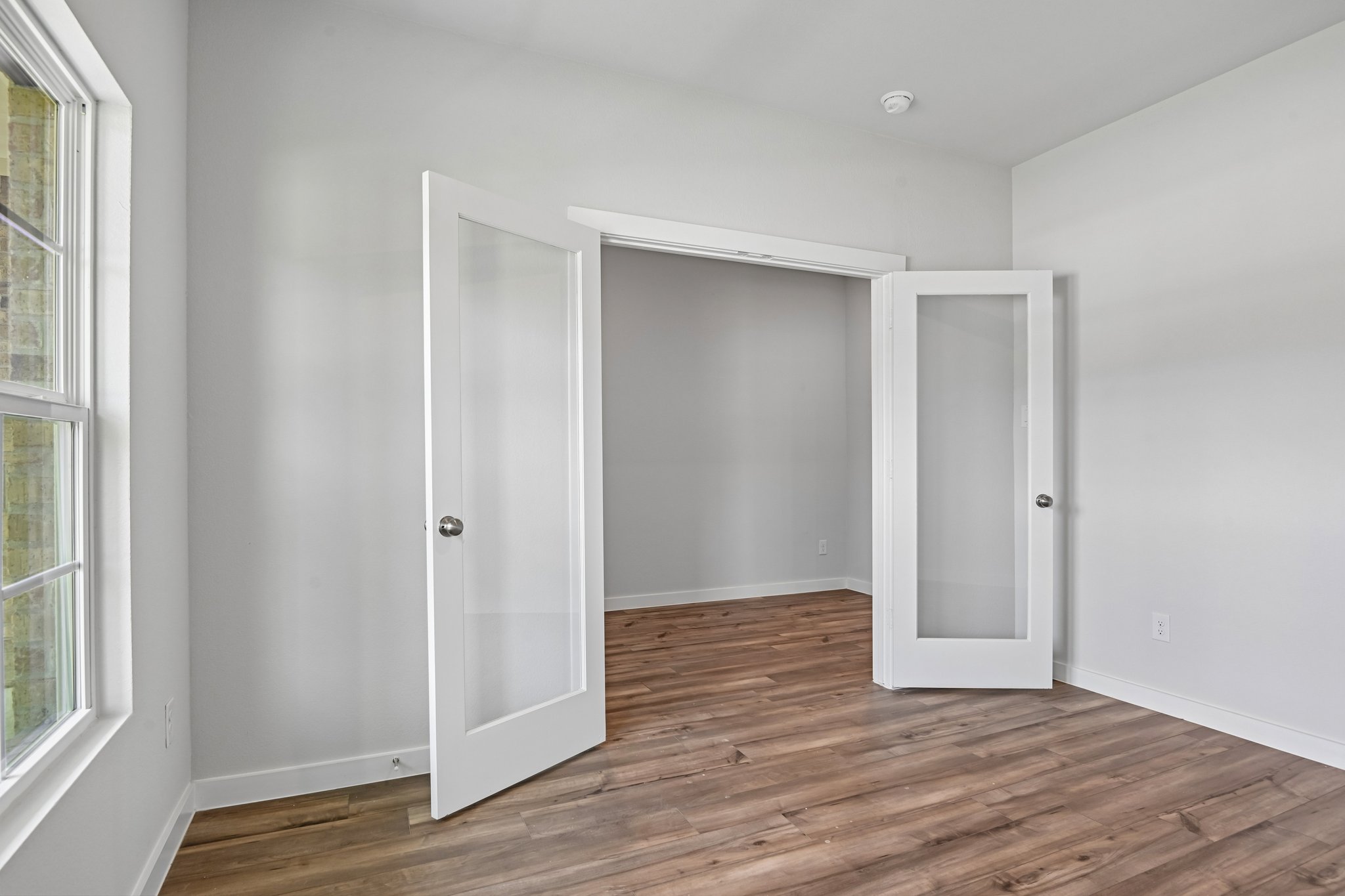 A room with white doors.