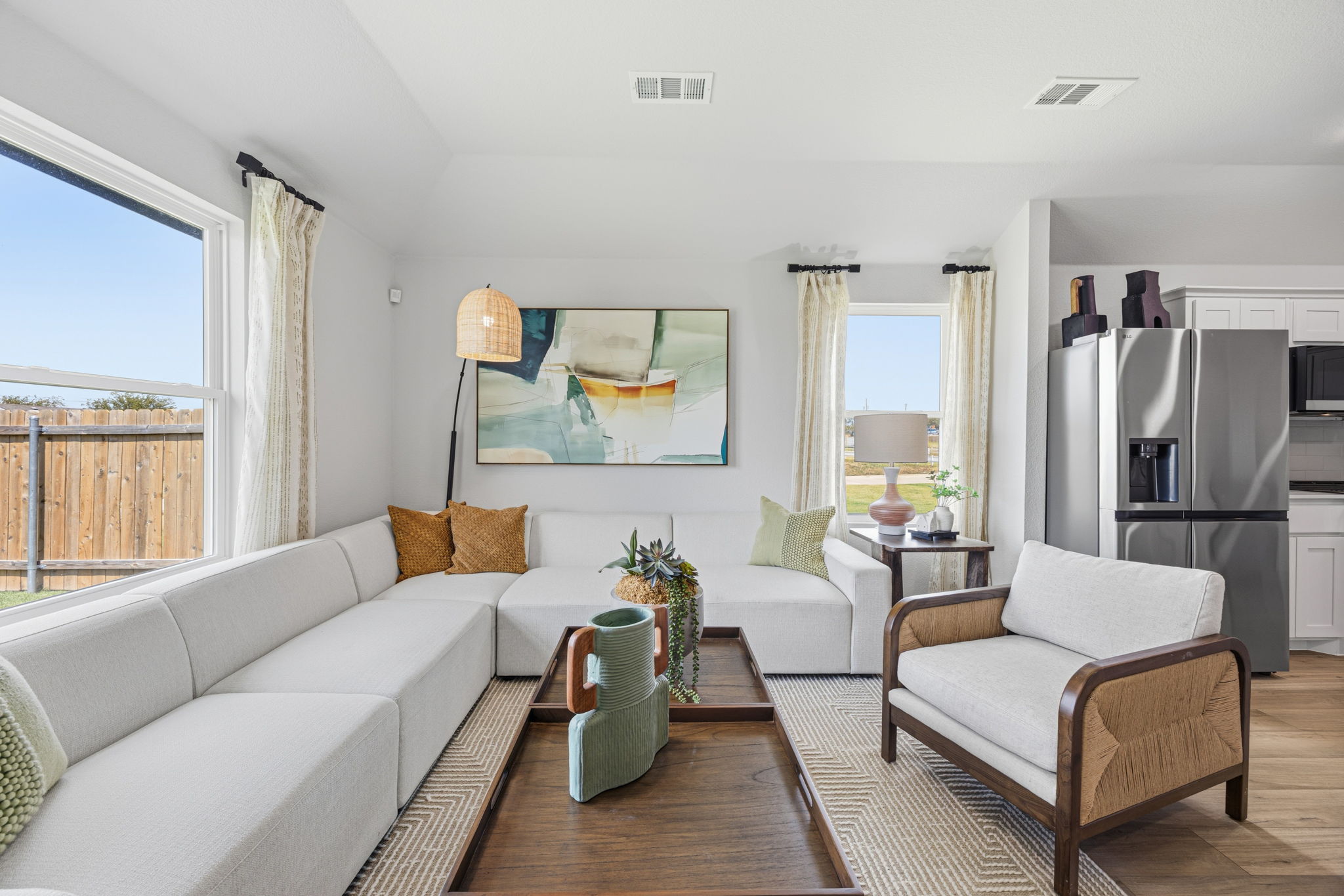 A living room with a large window.