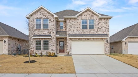 A large house with a garage.