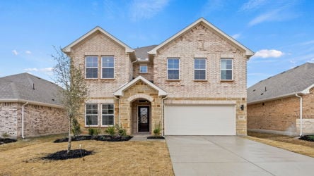 A large house with a garage.
