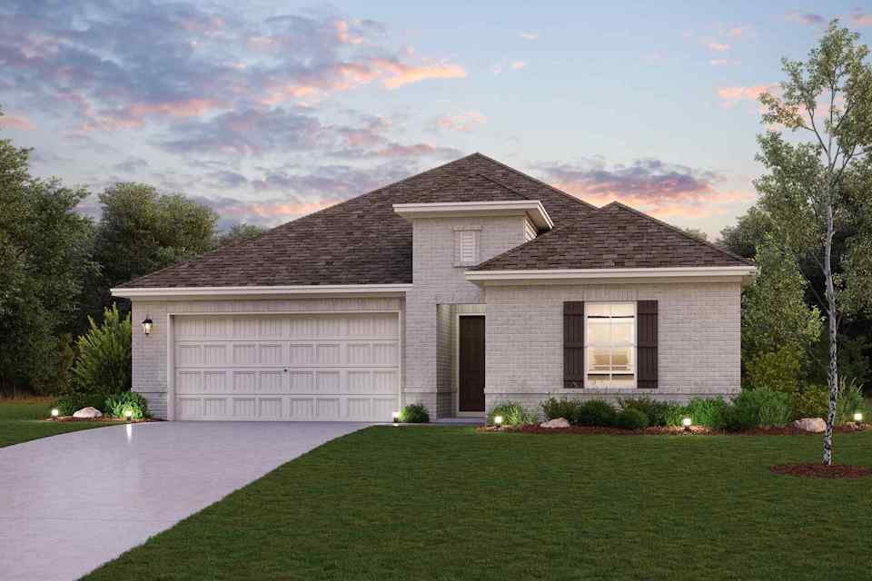 A house with a lawn and trees.