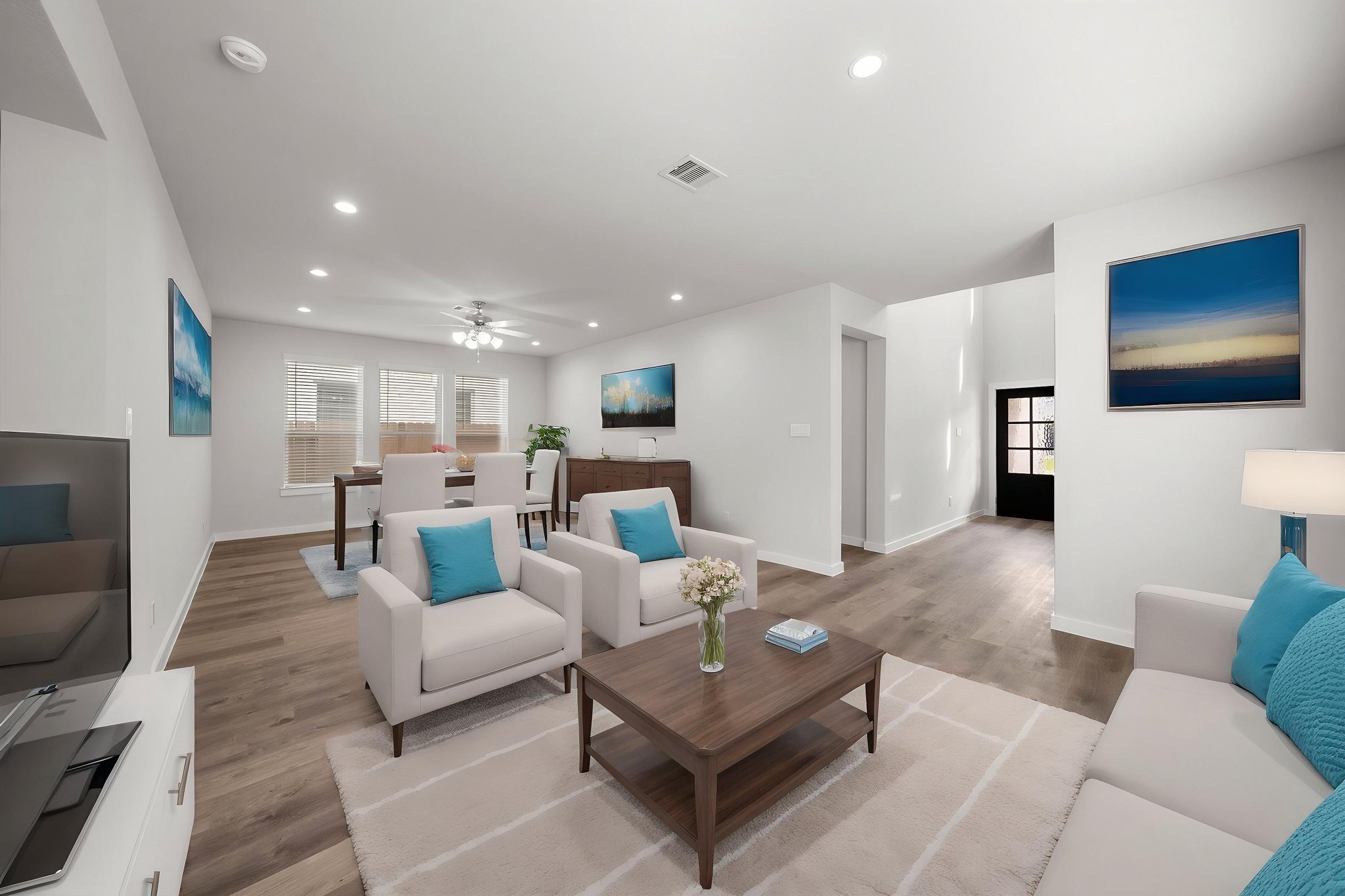 A living room with a large window.