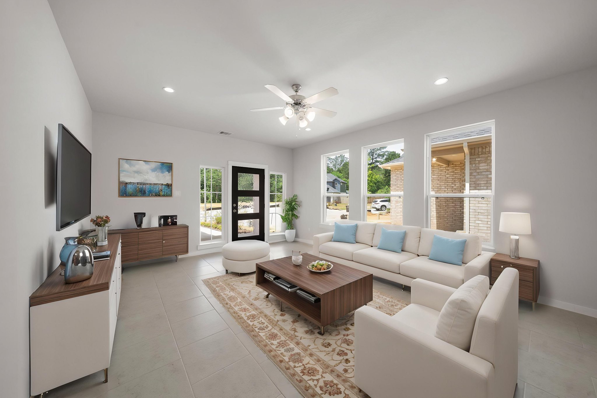 A living room with a large window.