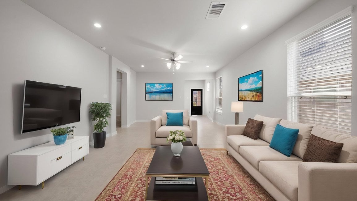 A living room with a tv and couches.