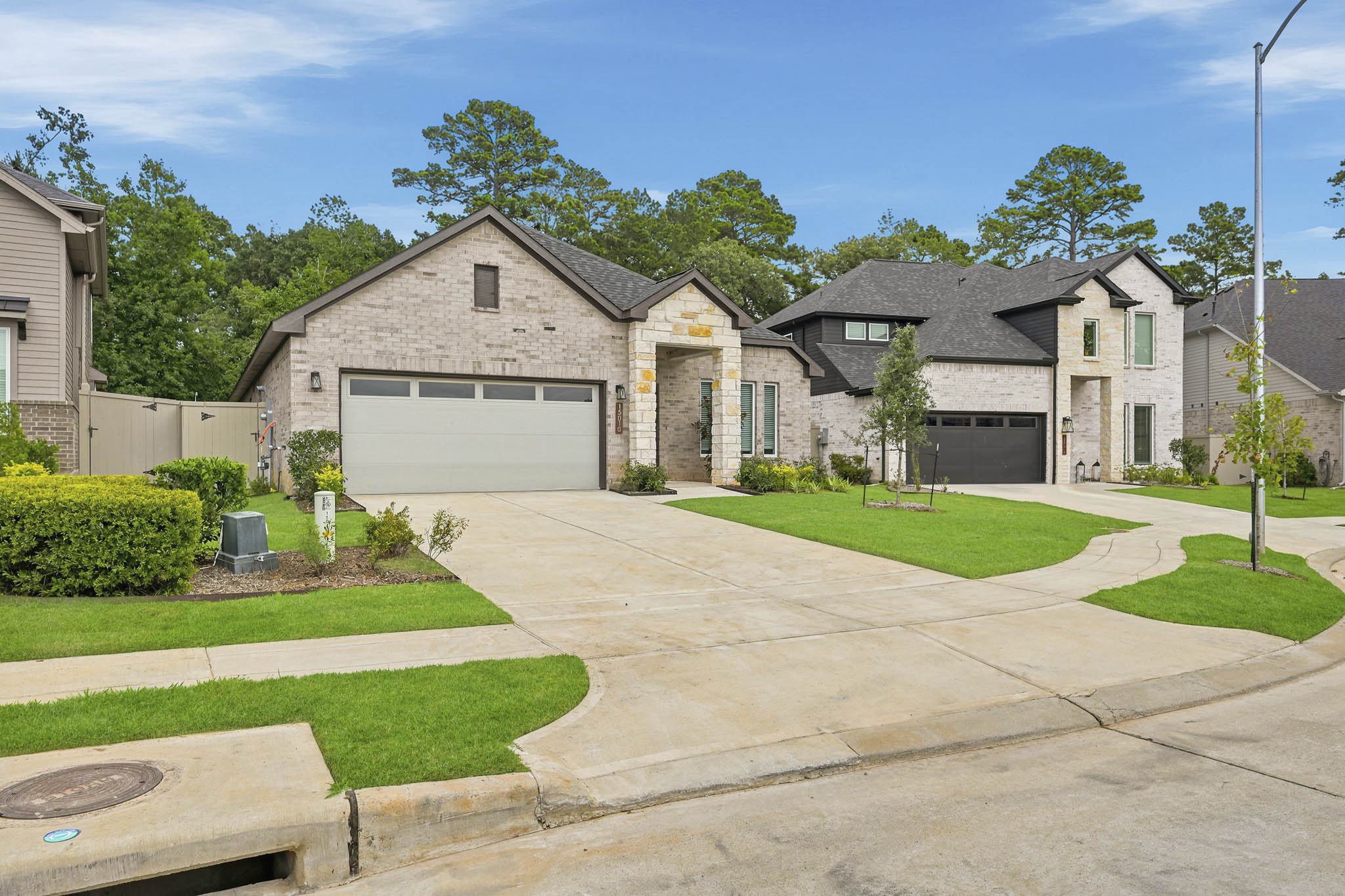 A driveway leading to a house.