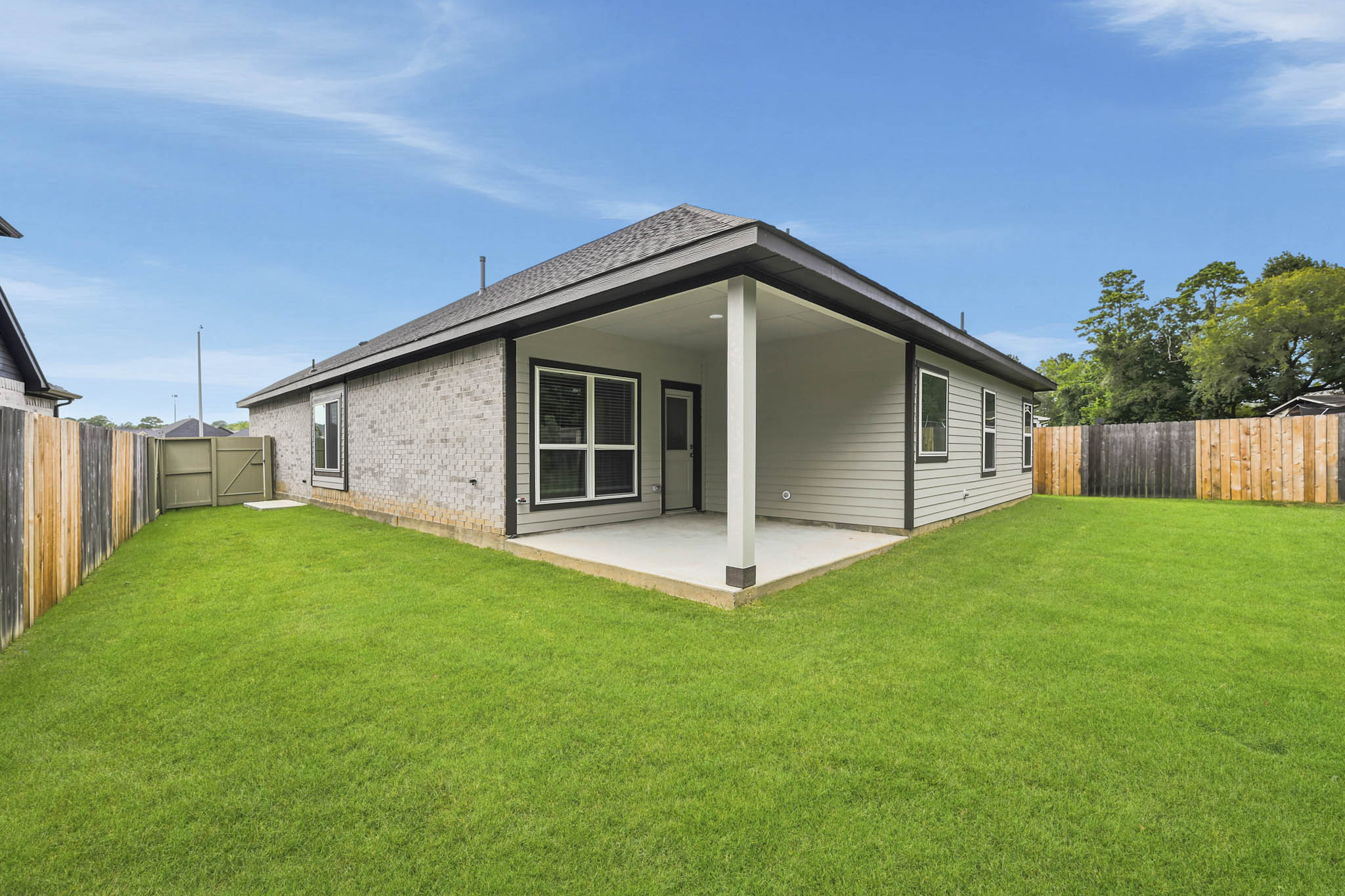 A house with a fence around it.