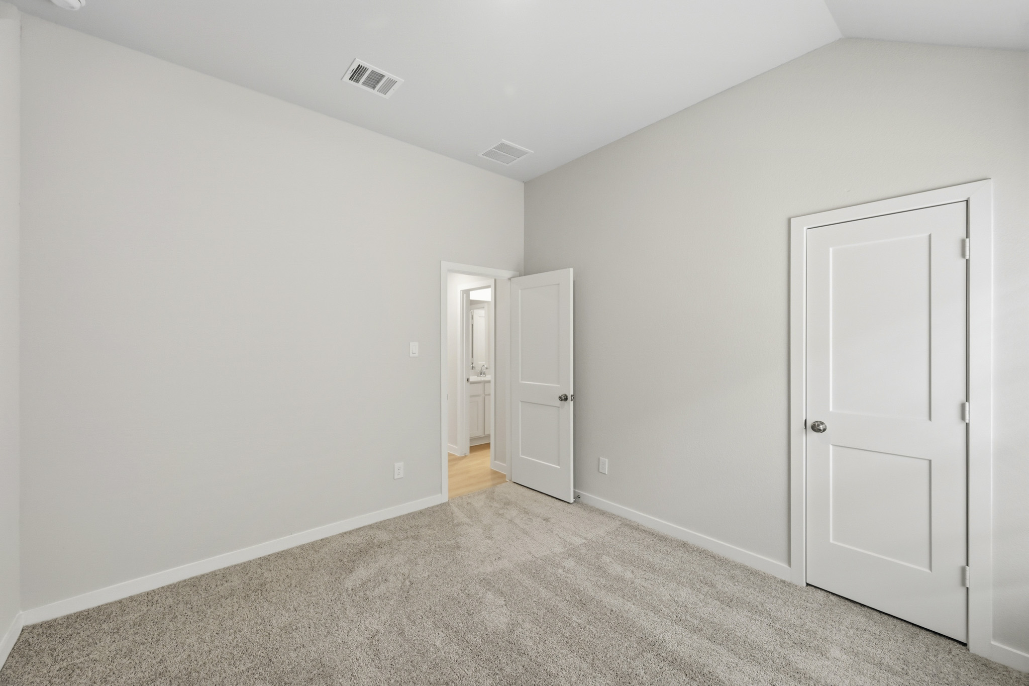 A room with white doors.