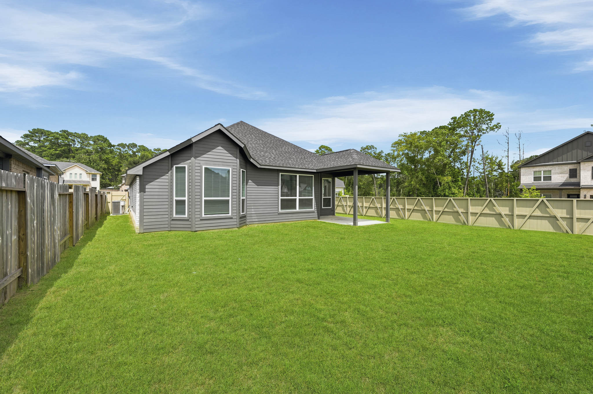 A house with a fence around it.