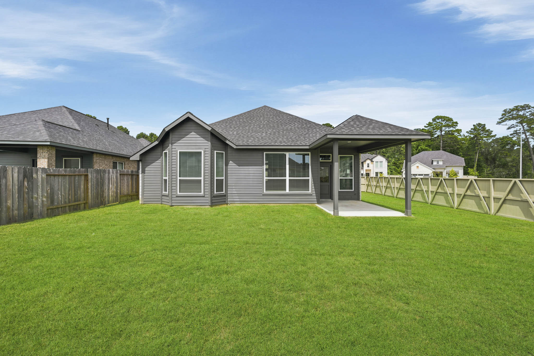 A house with a fence around it.
