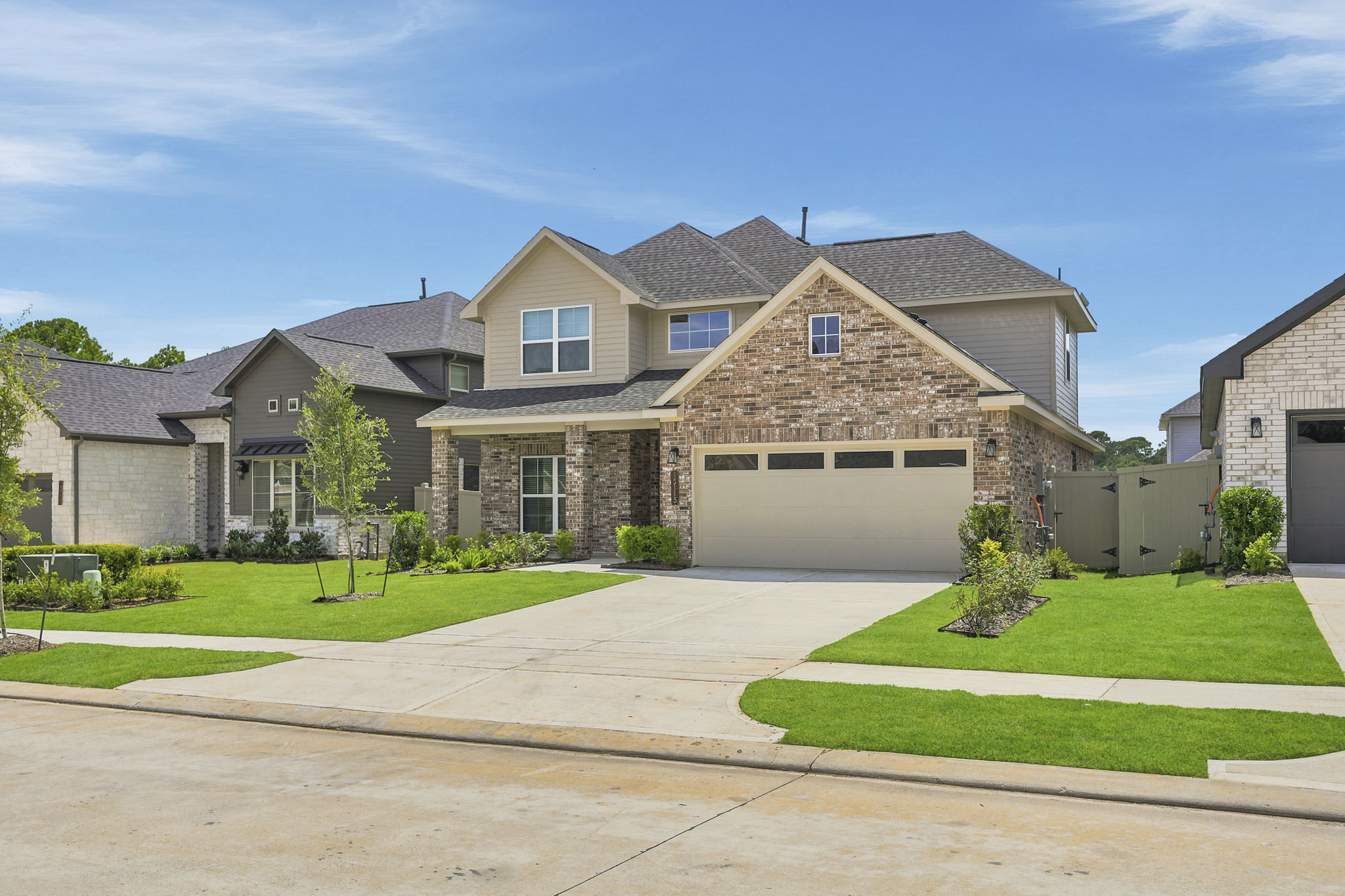 A large house with a driveway.