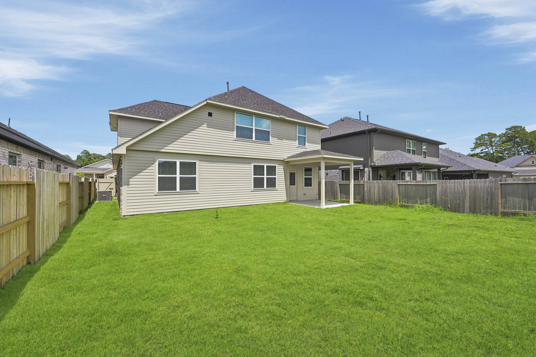 A house with a fence around it.