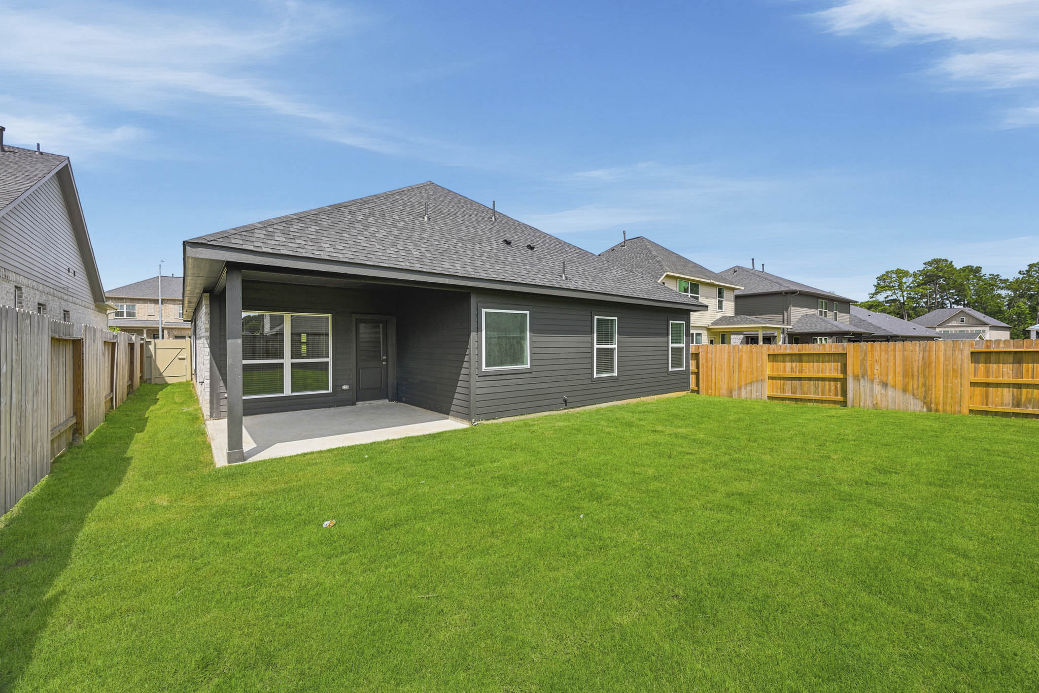 A house with a fence around it.