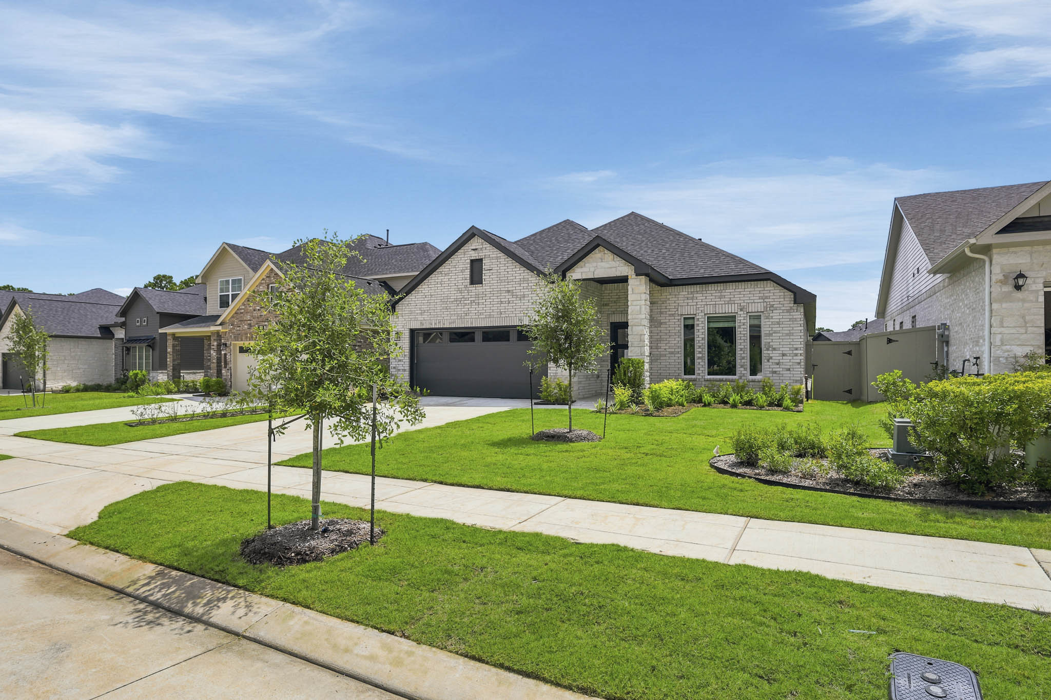 A large house with a driveway.