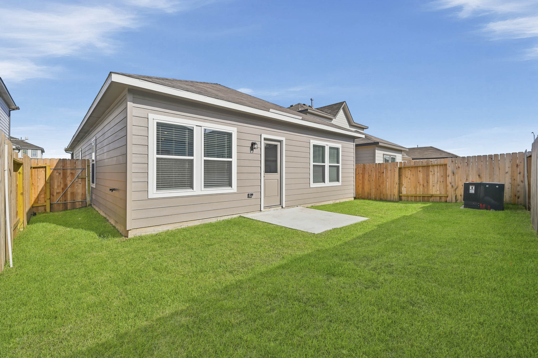 A house with a fence around it.