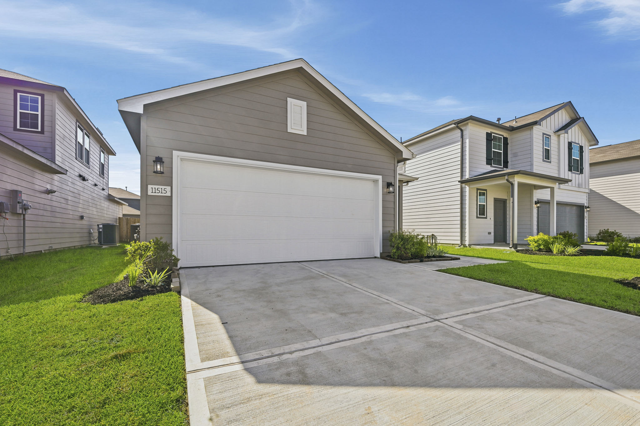A driveway leading to a house.